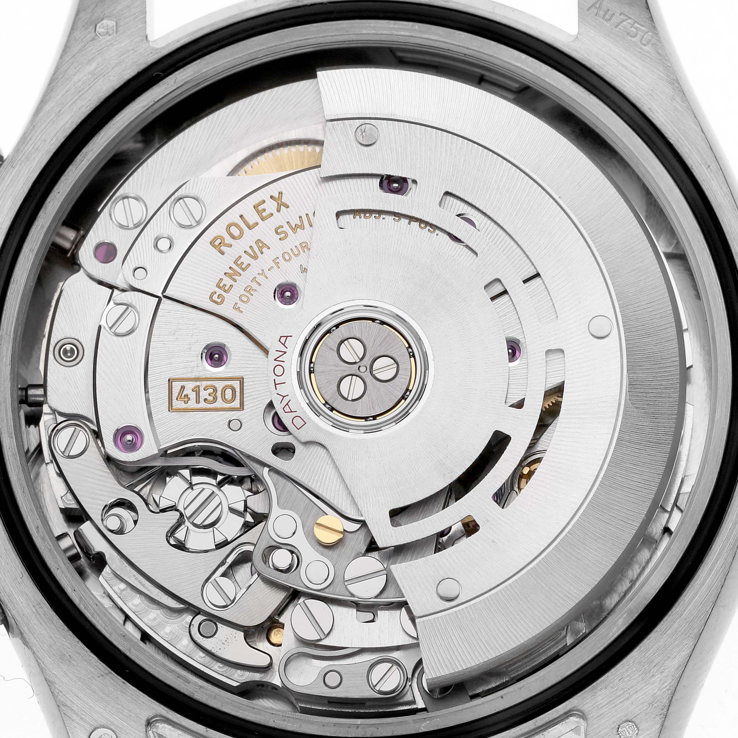 The image shows the Rolex Daytona 116509NG Men
s White Gold Mother of Pearl Dial watch
s movement, viewed from the back, highlighting its intricate mechanics.