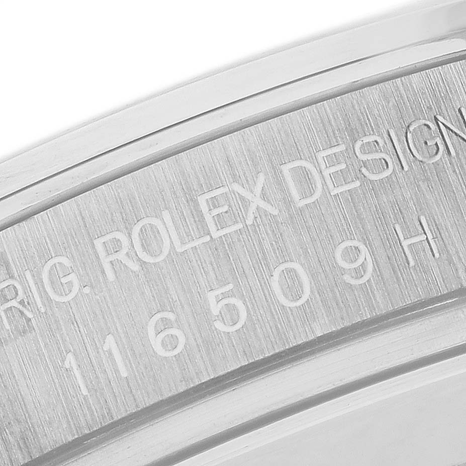 The image shows a close-up of the engraved underside of the bezel on a Rolex Daytona 116509NG Men
s White Gold Mother of Pearl Dial watch, highlighting the model number.