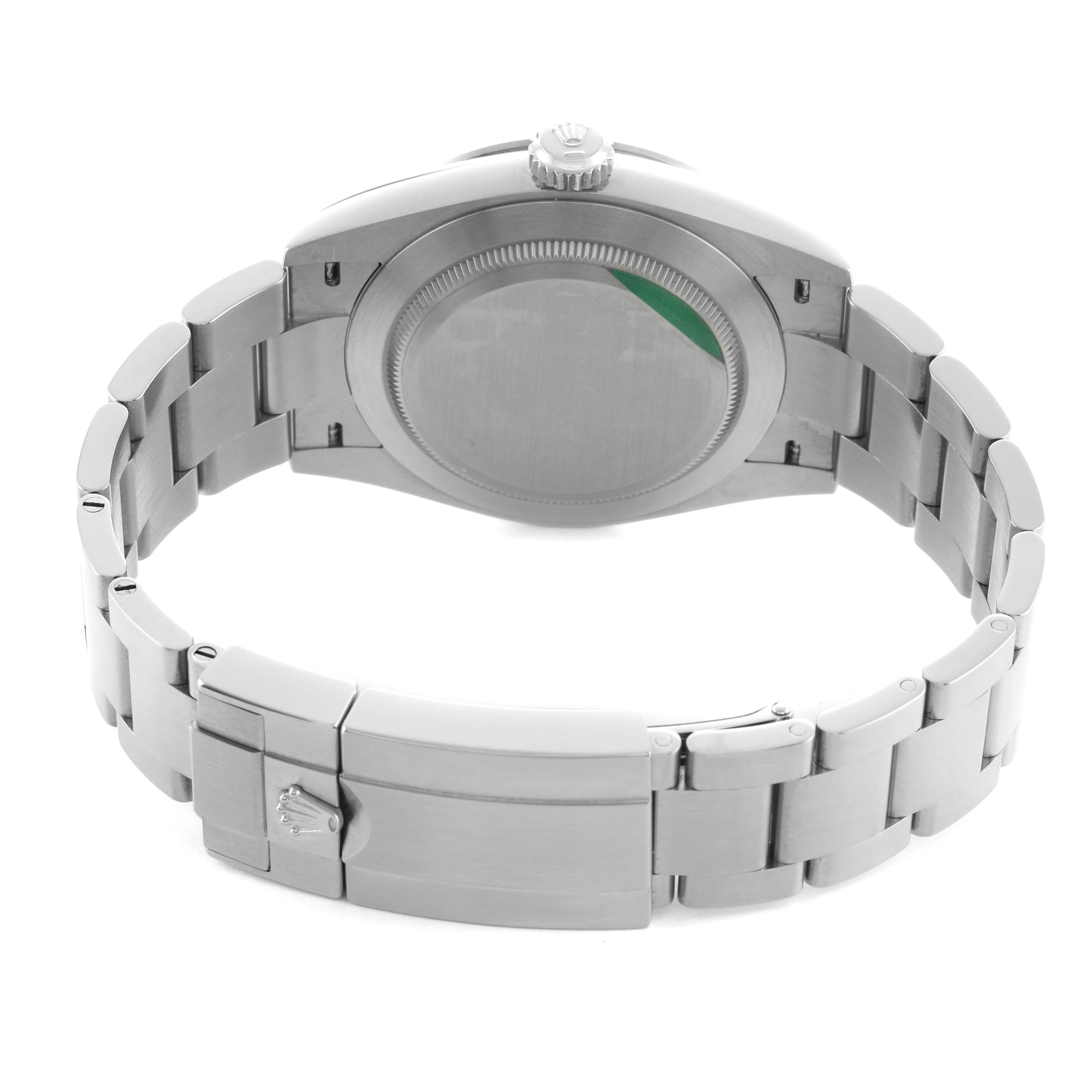 The image shows the back view of a Rolex Explorer 224270 Men's Stainless Steel Black Dial, highlighting the caseback, crown, and metal bracelet with a clasp.