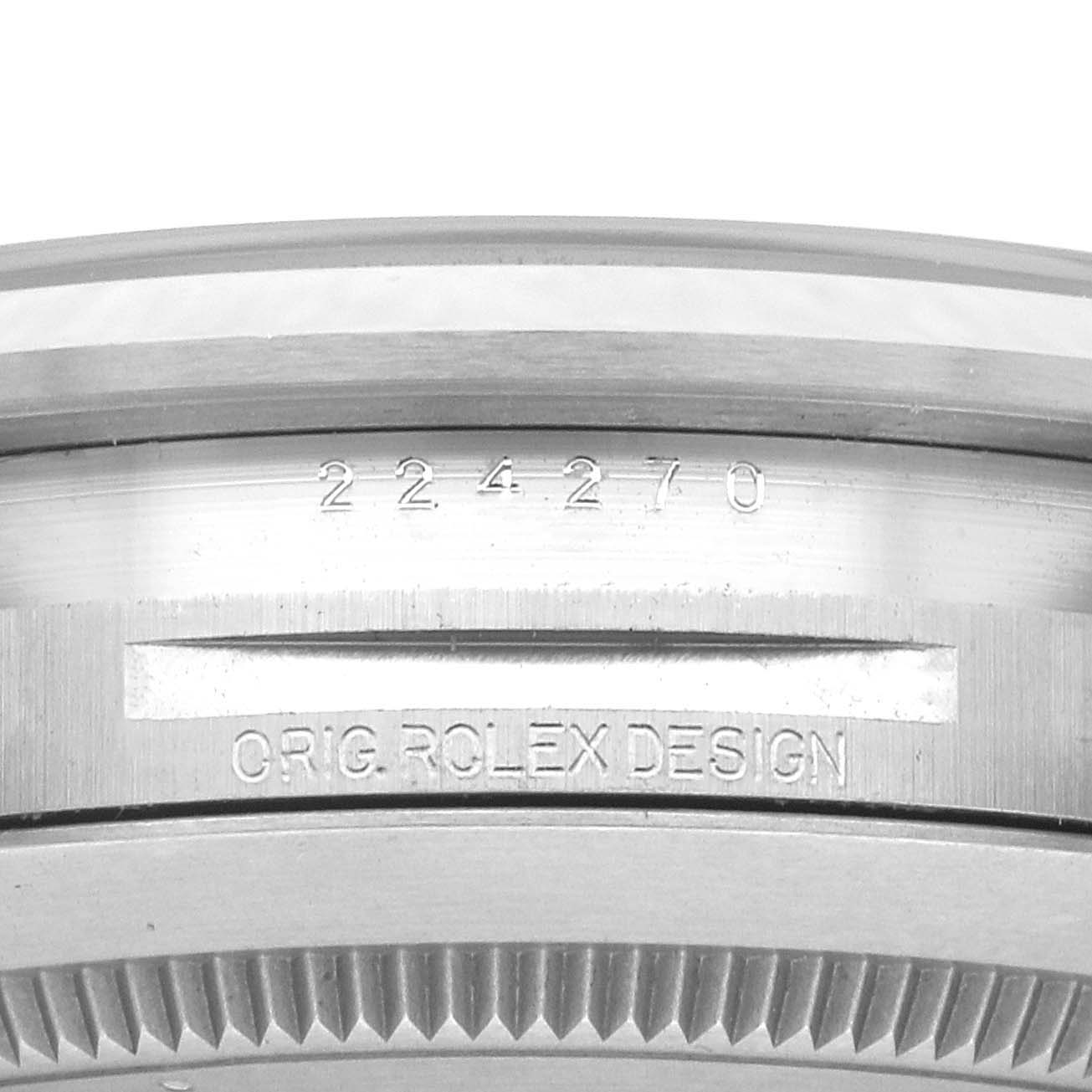 This image shows a close-up of the side of a Rolex Explorer 224270 Men's Stainless Steel Black Dial watch, highlighting the model number and "ORIG. ROLEX DESIGN" engraving.