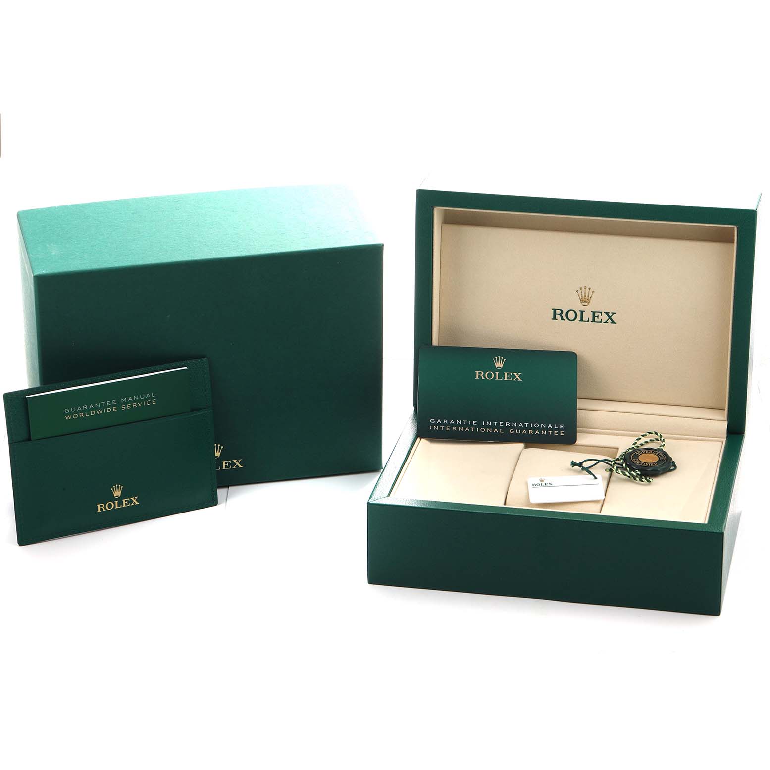 The image shows the packaging and accessories of a Rolex Explorer 224270 Men's Stainless Steel Black Dial, including its box, manuals, and tags.
