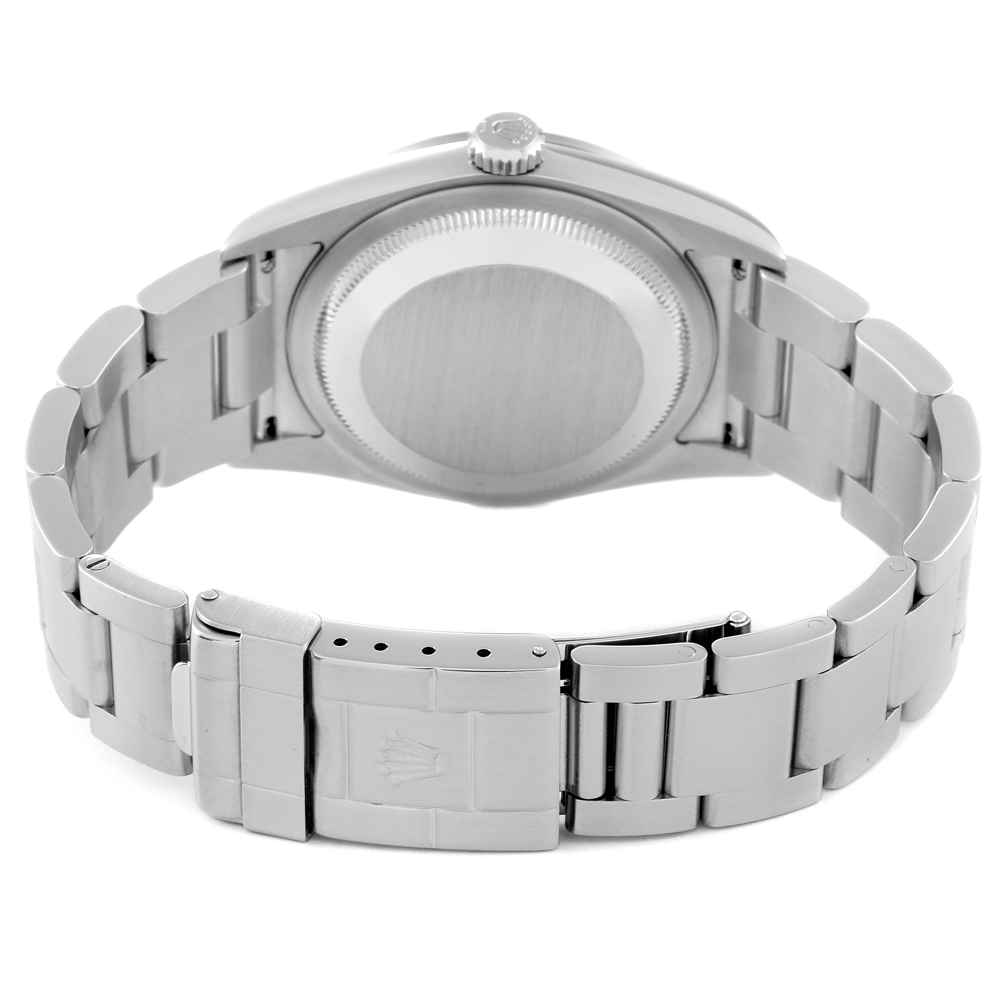 The image shows the back view of a Rolex Explorer 114270 Men
s Stainless Steel Black Dial 114270 Men
s Stainless Steel Black Dial watch, focusing on the case back and bracelet clasp.