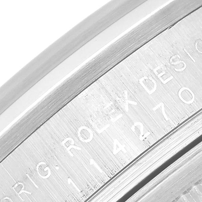 The image shows a close-up of the casing edge with engraved model details of a Rolex Explorer 114270 Men
s Stainless Steel Black Dial 114270 Men
s Stainless Steel Black Dial watch.