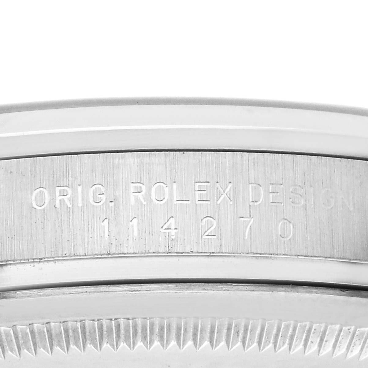 The image shows the side engraving on the bezel of a Rolex Explorer 114270 Men's Stainless Steel Black Dial 114270 Men's Stainless Steel Black Dial watch, highlighting the model number 114270.