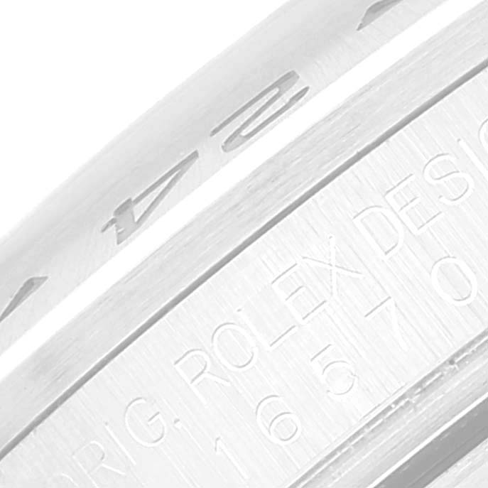 This is a close-up shot of the bezel and inner engraving of the Rolex Explorer 16570 Men
s Stainless Steel Black Dial 16570 Men
s Stainless Steel Black Dial watch.