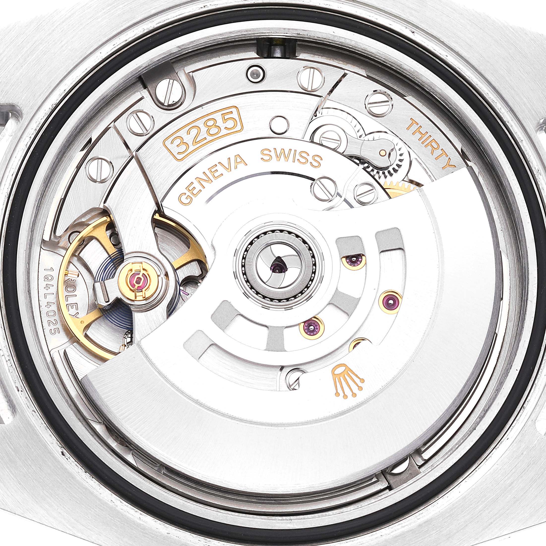 The image shows a close-up of the movement and inner mechanism of a Rolex GMT-Master 126710 Men's Stainless Steel Black Dial 126710 Men's Stainless Steel Black Dial watch, highlighting the rotor and balance wheel.
