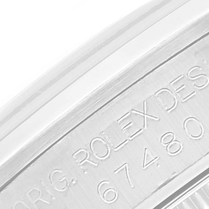 This close-up image shows the engraved side of the case body with the inscription on a Rolex Mid-Size 67480 Women
s Stainless Steel Pink Dial 67480 Women
s Stainless Steel Pink Dial model watch.