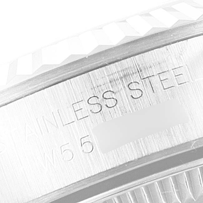 This image shows a close-up of the stainless steel case back engraving on a Rolex Oyster Perpetual 67194 Women's Stainless Steel Silver Dial 67194 Women's Stainless Steel Silver Dial watch.