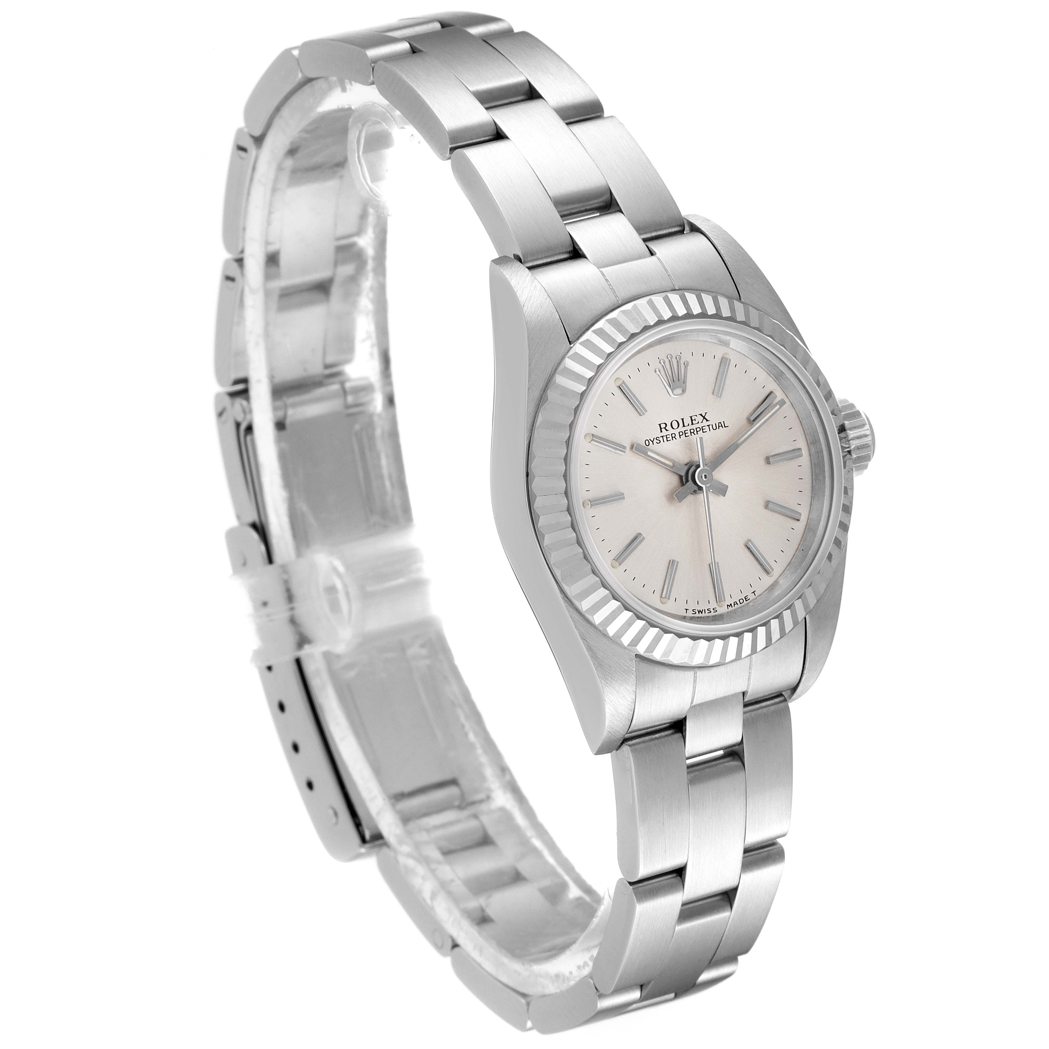 This image shows a side angle of a Rolex Oyster Perpetual 67194 Women's Stainless Steel Silver Dial 67194 Women's Stainless Steel Silver Dial watch, highlighting its bracelet, clasp, and face.