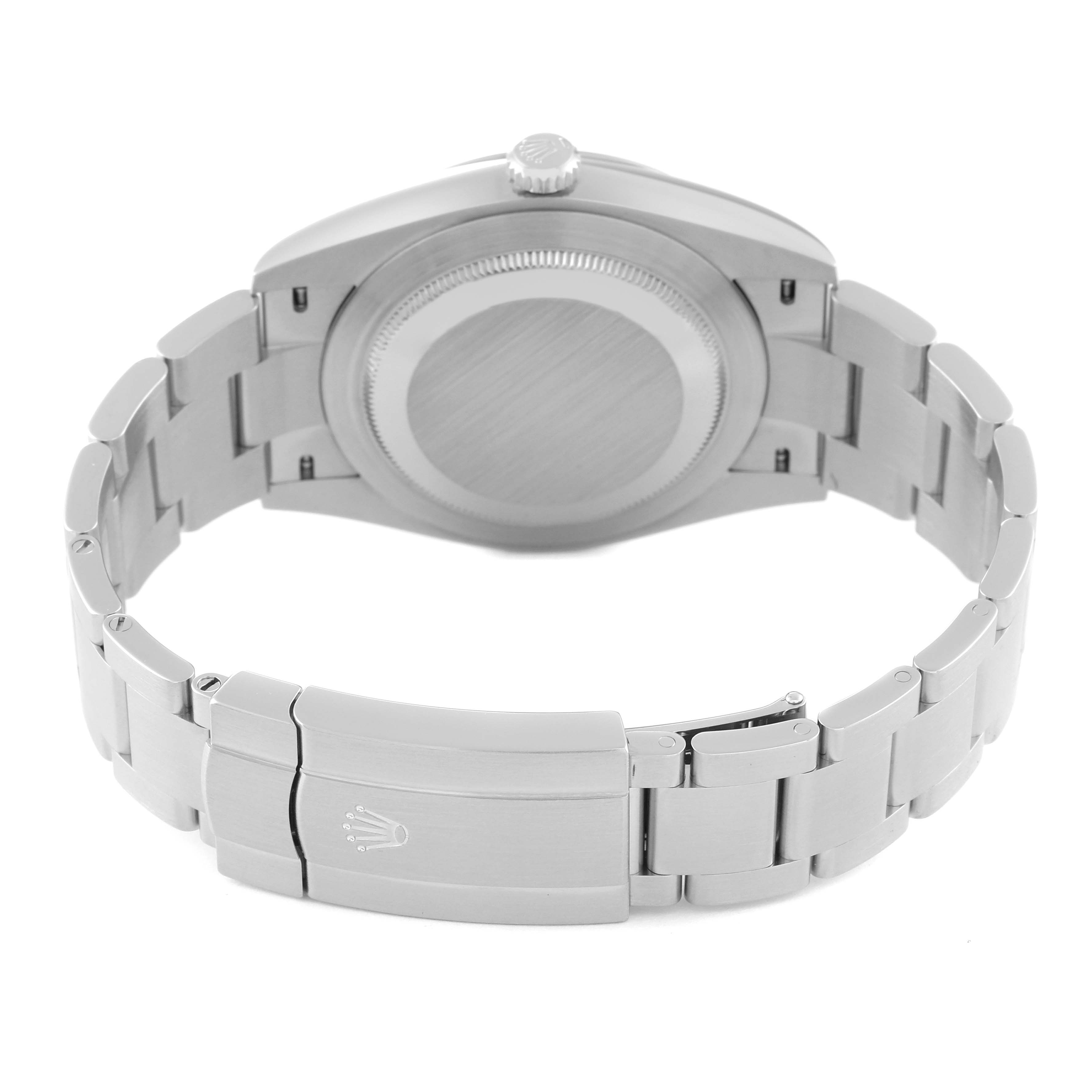 The image shows the back view of a Rolex Oyster Perpetual 124300 Men's Stainless Steel Silver Dial 124300 Men's Stainless Steel Silver Dial watch, highlighting the closed oysterclasp and bracelet.