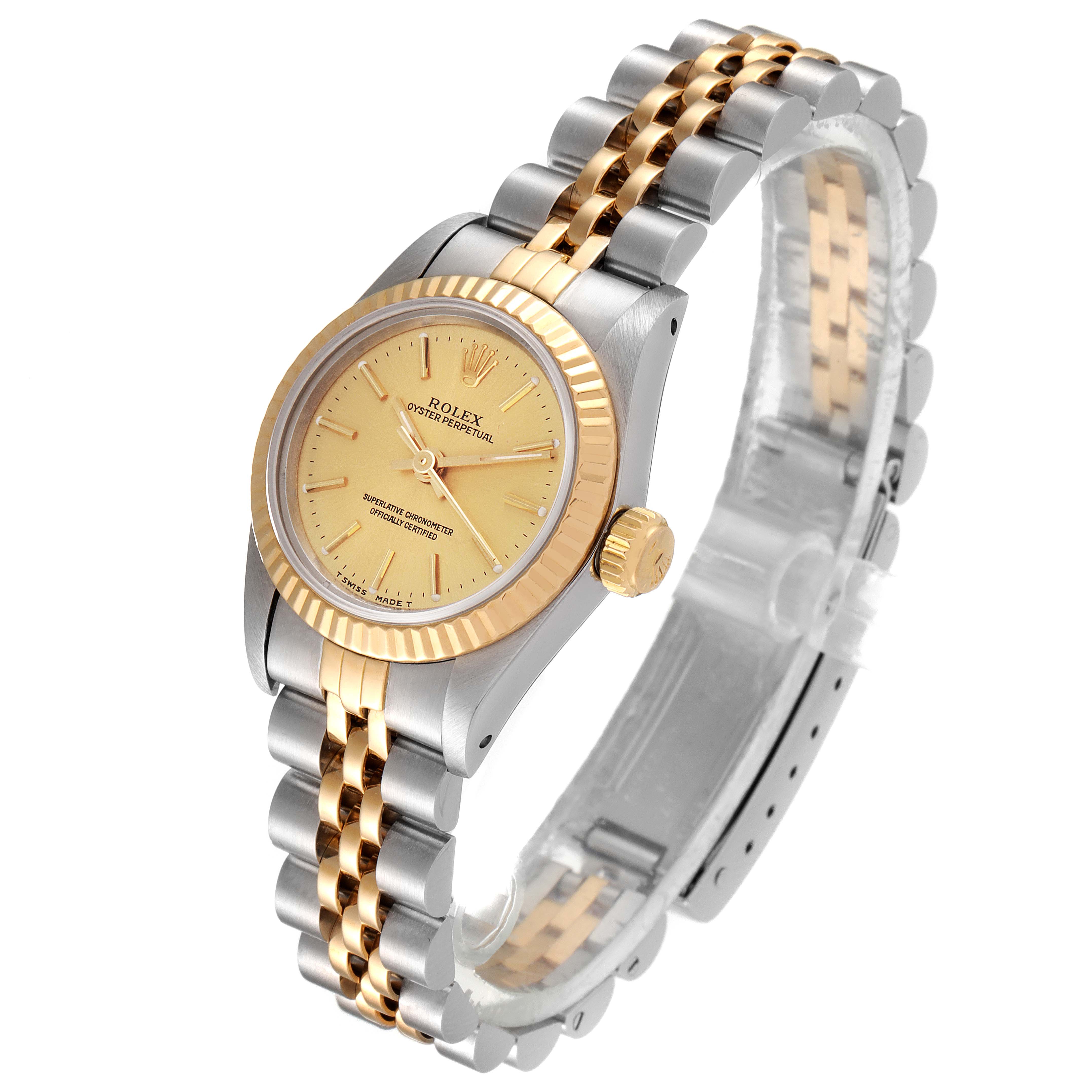 The image shows a Rolex Oyster Perpetual 67193 Women
s Steel and Gold (two tone) Champagne Dial 67193 Women
s Steel and Gold (two tone) Champagne Dial watch at an angle highlighting the dial, bezel, crown, and bracelet.