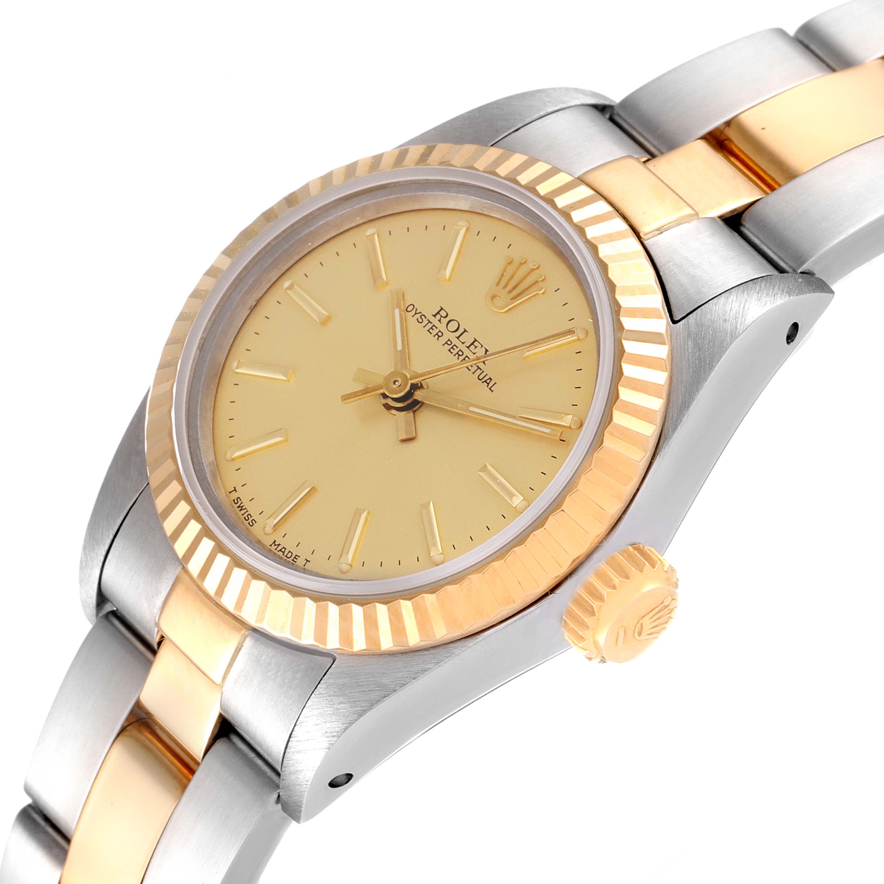 This image shows a Rolex Oyster Perpetual 67193 Women's Steel and Gold (two tone) Champagne Dial 67193 Women's Steel and Gold (two tone) Champagne Dial watch at a slight angle, highlighting the dial, bezel, crown, and part of the bracelet.