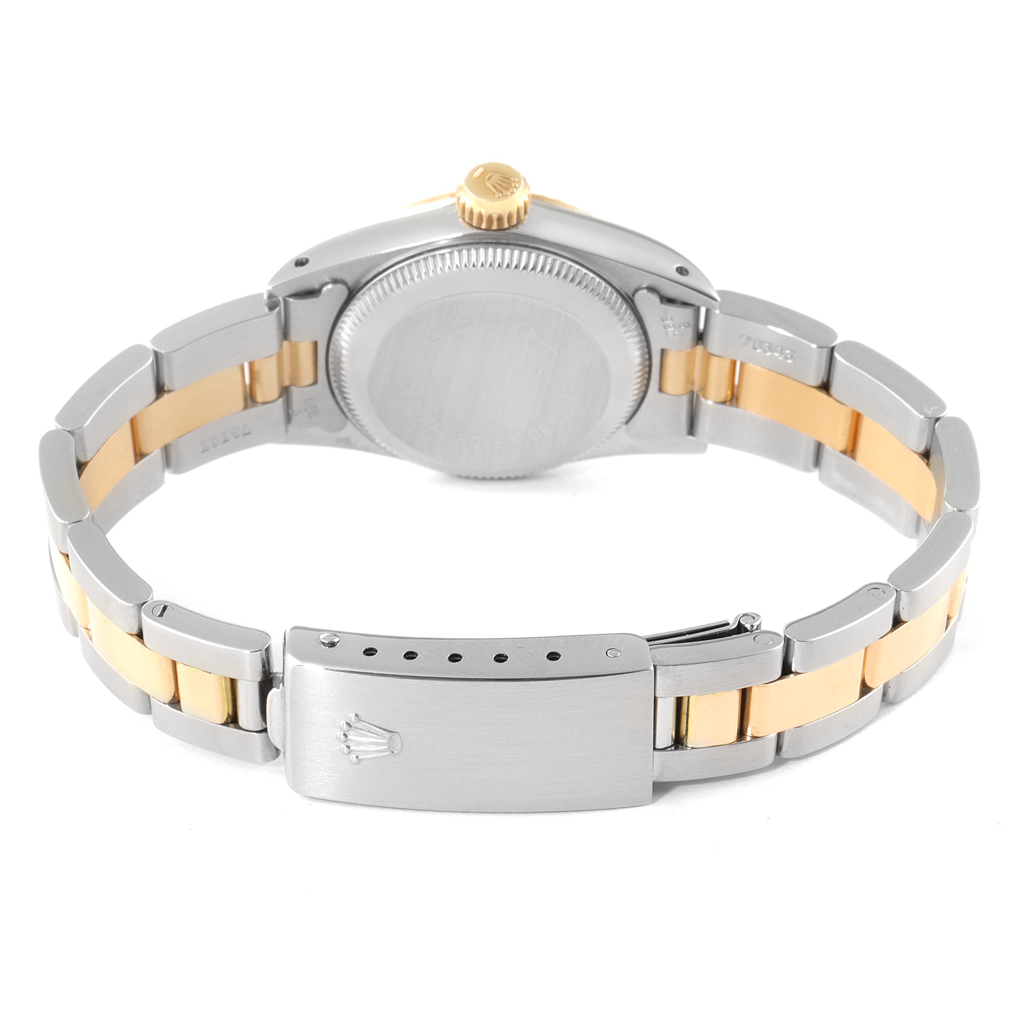 This image shows the back and clasp of a Rolex Oyster Perpetual 67193 Women's Steel and Gold (two tone) Champagne Dial 67193 Women's Steel and Gold (two tone) Champagne Dial watch from a rear angle.