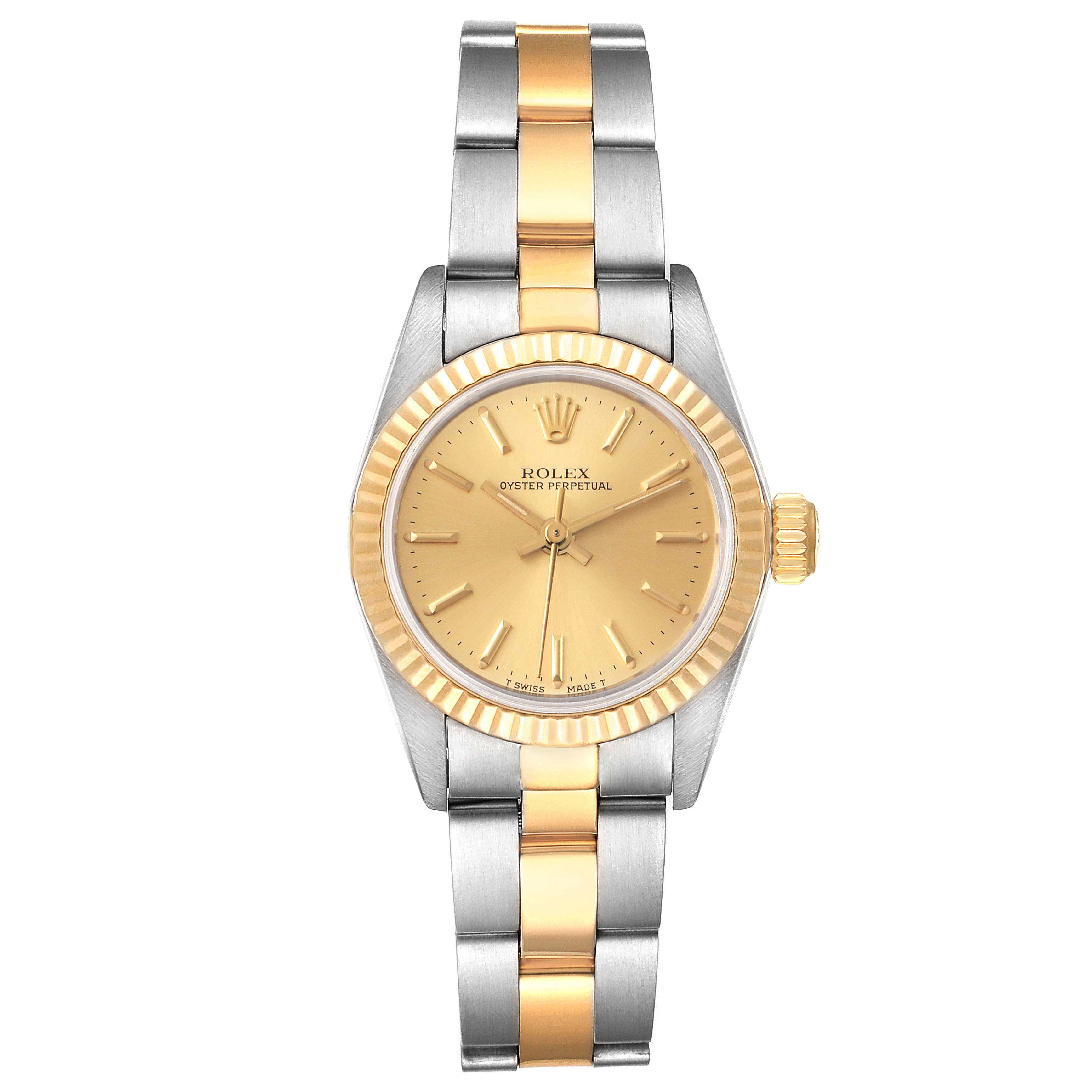 This image shows a front view of a Rolex Oyster Perpetual 67193 Women's Steel and Gold (two tone) Champagne Dial 67193 Women's Steel and Gold (two tone) Champagne Dial watch, highlighting its gold and silver bracelet, gold dial, and bezel.