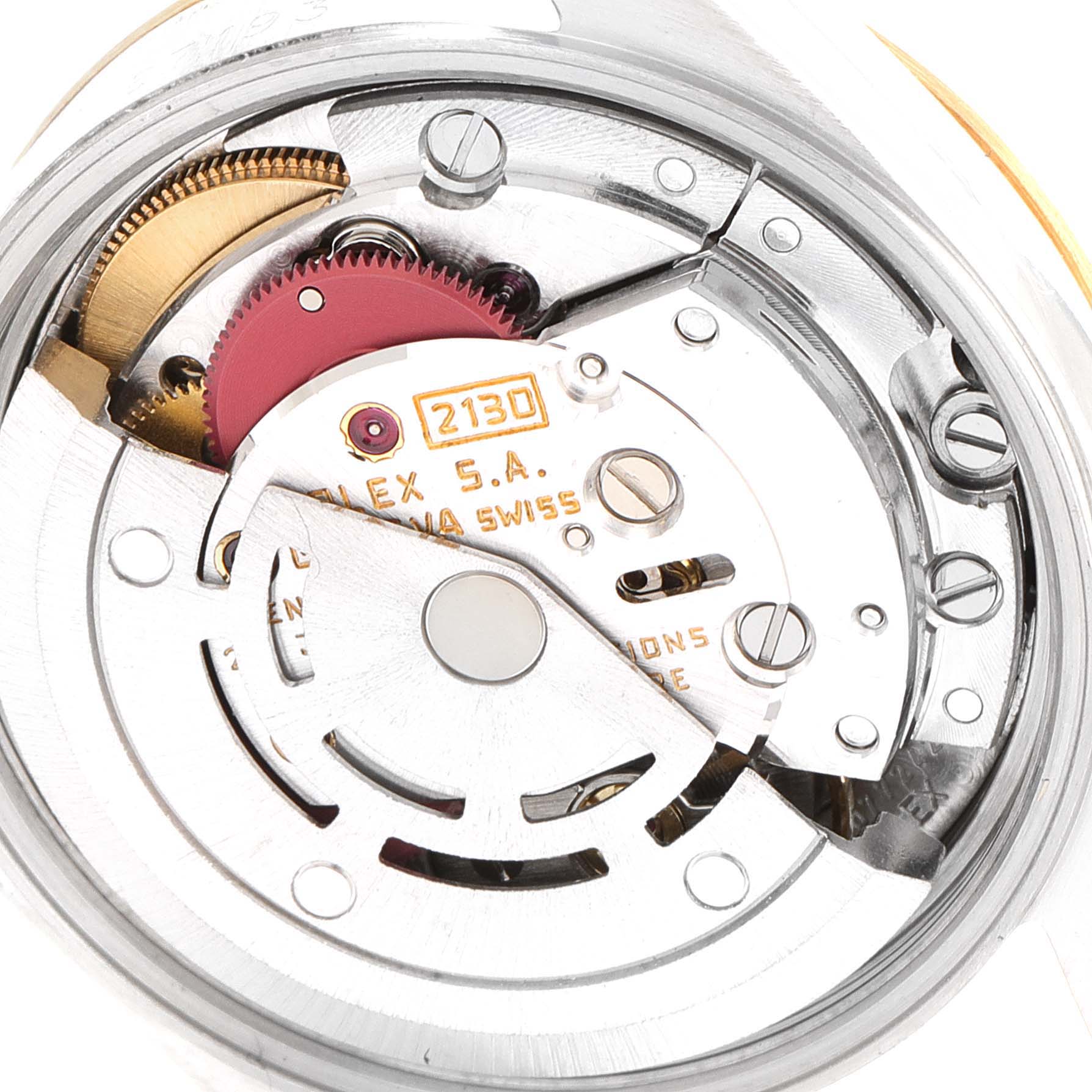 This image shows the internal movement of a Rolex Oyster Perpetual 67193 Women's Steel and Gold (two tone) Champagne Dial 67193 Women's Steel and Gold (two tone) Champagne Dial watch, focusing on the caliber 2130 mechanism.