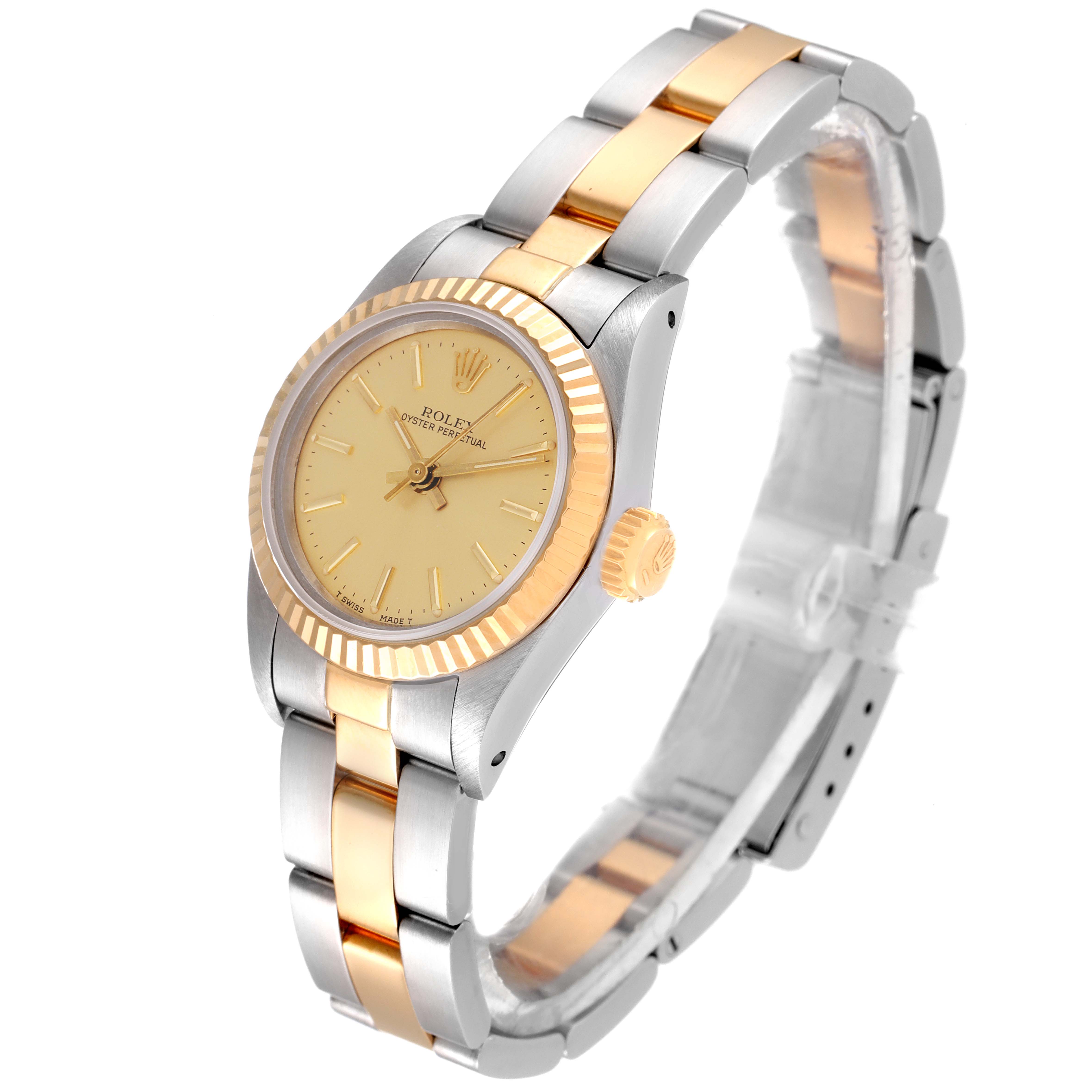 The image shows a Rolex Oyster Perpetual 67193 Women's Steel and Gold (two tone) Champagne Dial 67193 Women's Steel and Gold (two tone) Champagne Dial watch at a three-quarter angle, highlighting the dial, case, bezel, and bracelet.