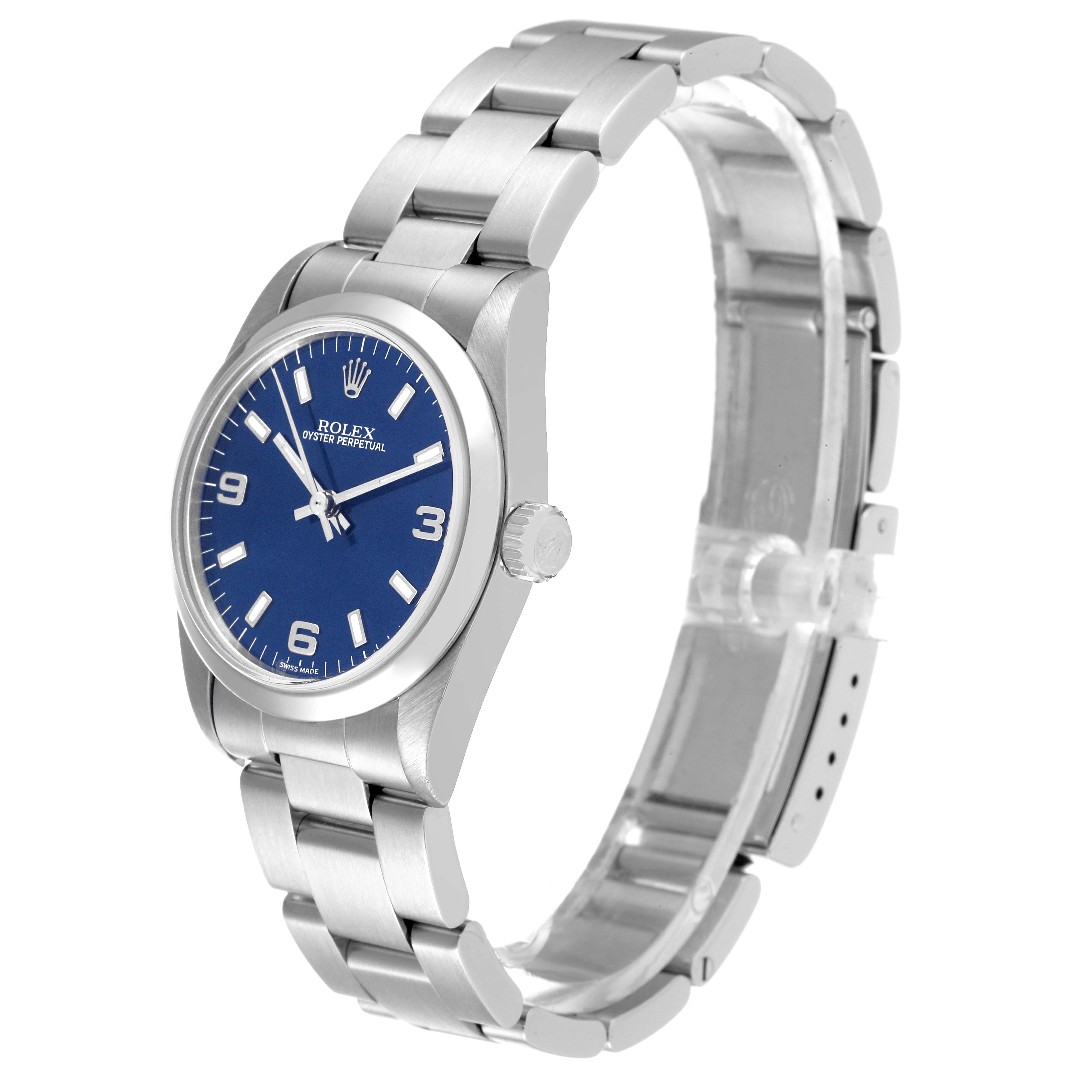 The image shows a Rolex Mid-Size 77080 Women
s Stainless Steel Blue Dial 77080 Women
s Stainless Steel Blue Dial Oyster Perpetual watch from a side angle, displaying the face, bezel, and bracelet.