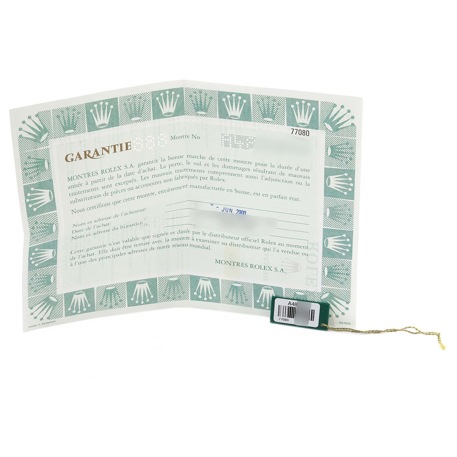 This image shows the warranty card and tag for a Mid-Size Rolex watch.