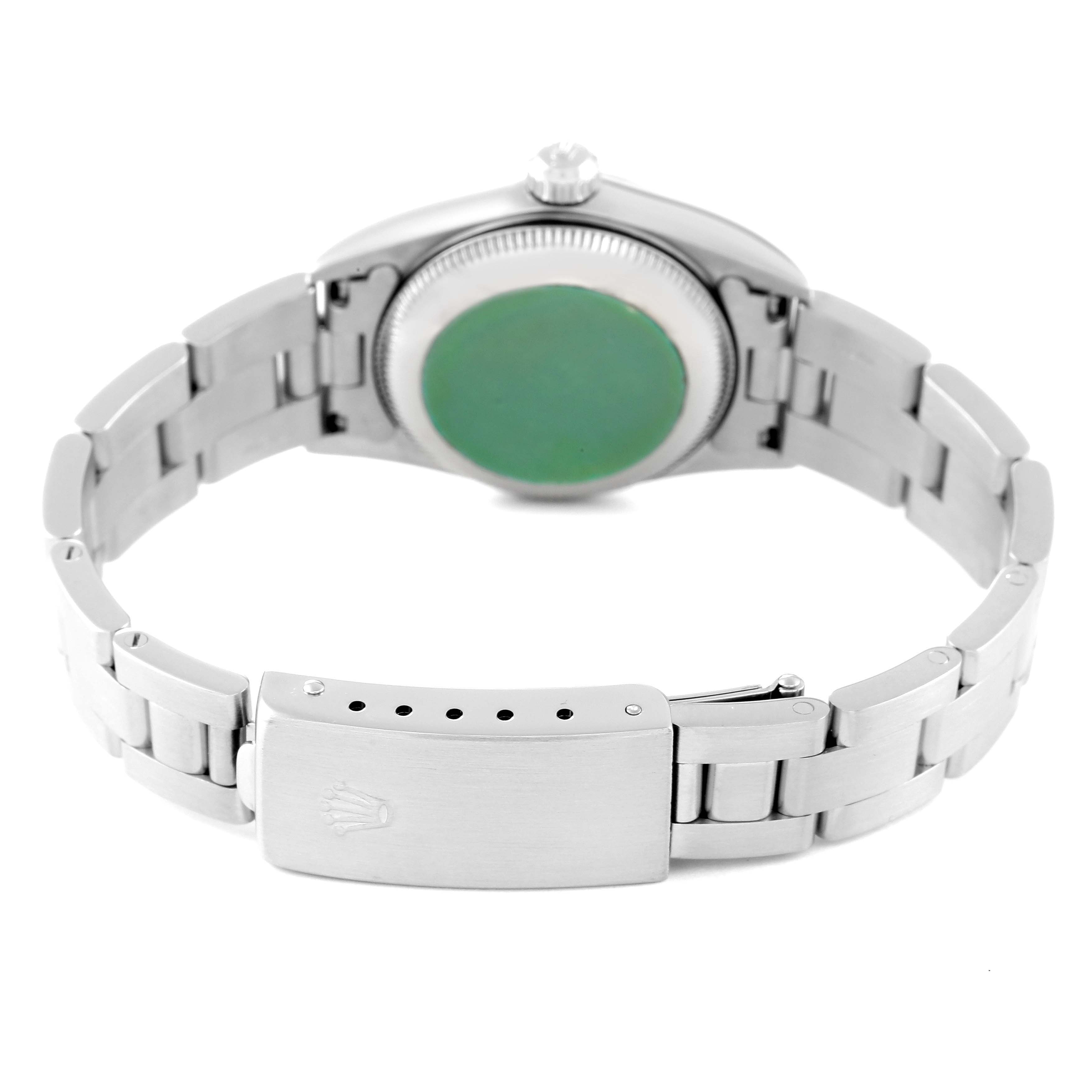 This image shows the back view of a Rolex Oyster Perpetual 76080 Women
s Stainless Steel Pink Dial 76080 Women
s Stainless Steel Pink Dial watch, displaying its bracelet and clasp.