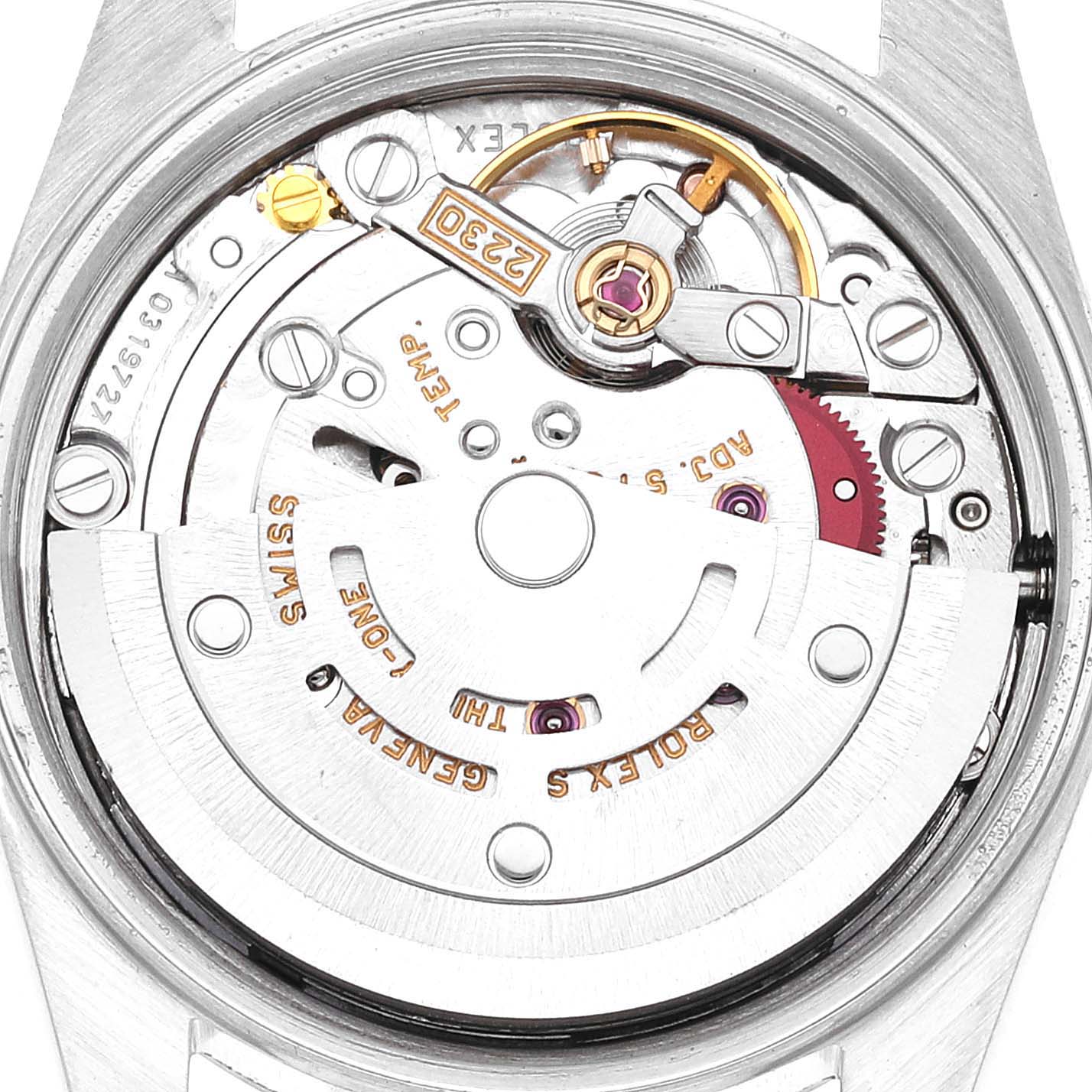 The image shows a close-up view of the movement and machinery inside the Rolex Oyster Perpetual 76080 Women
s Stainless Steel Pink Dial 76080 Women
s Stainless Steel Pink Dial watch.