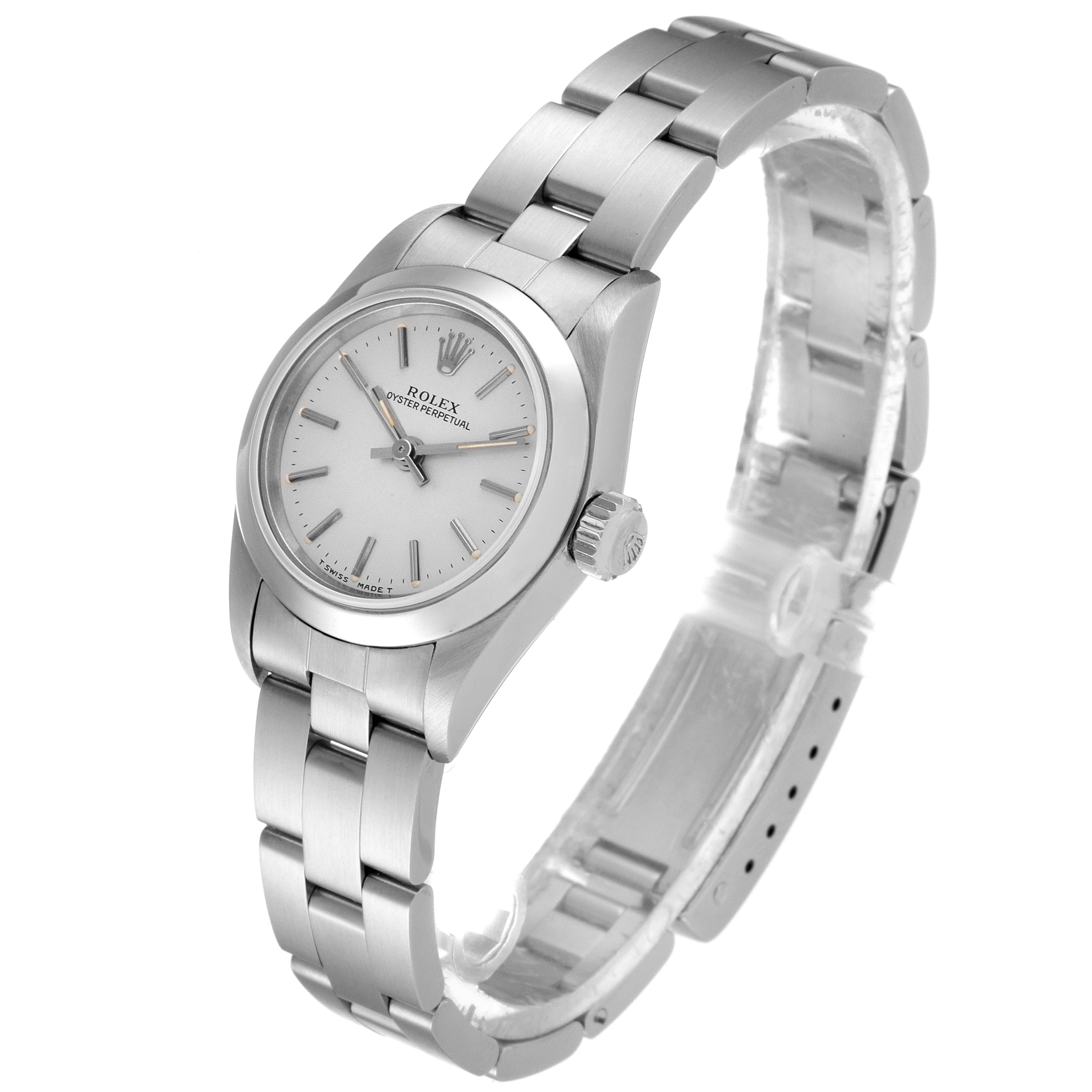 The Rolex Oyster Perpetual 67180 Women's Stainless Steel Silver Dial 67180 Women's Stainless Steel Silver Dial watch is shown from a slight top angle, displaying the dial, crown, and part of the bracelet.