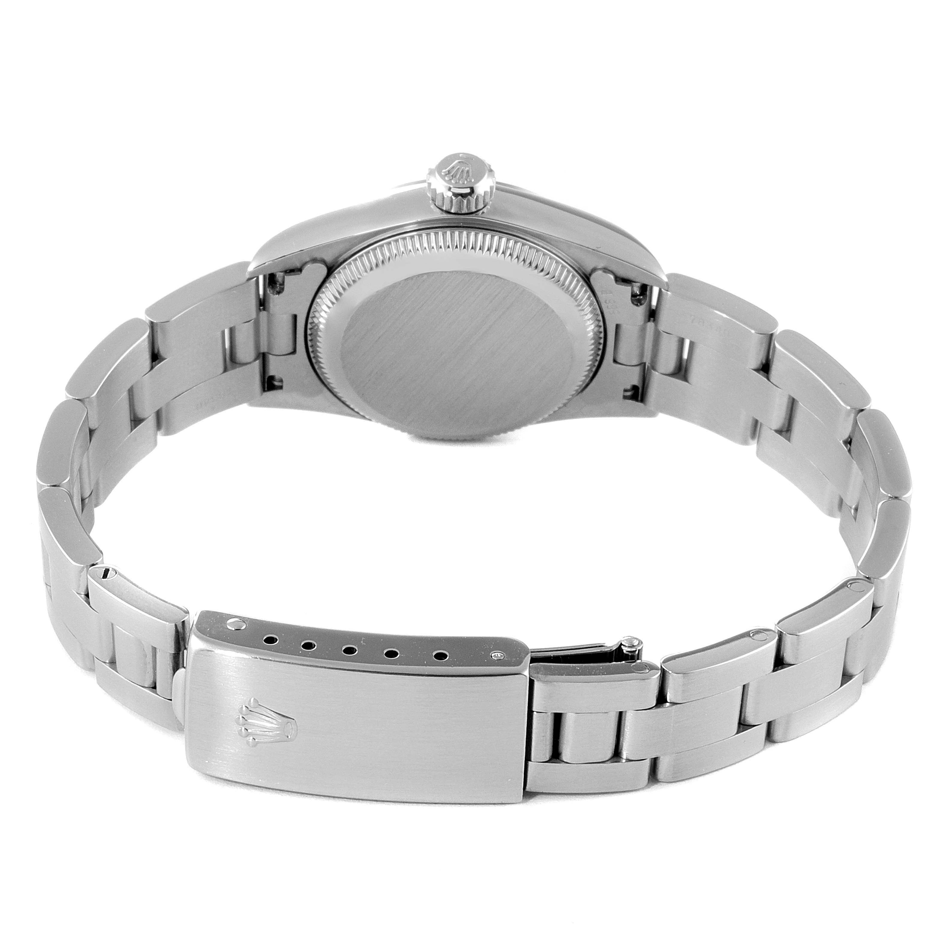 The image shows the back view of a Rolex Oyster Perpetual 67180 Women's Stainless Steel Silver Dial 67180 Women's Stainless Steel Silver Dial watch, highlighting the clasp, case back, and bracelet.