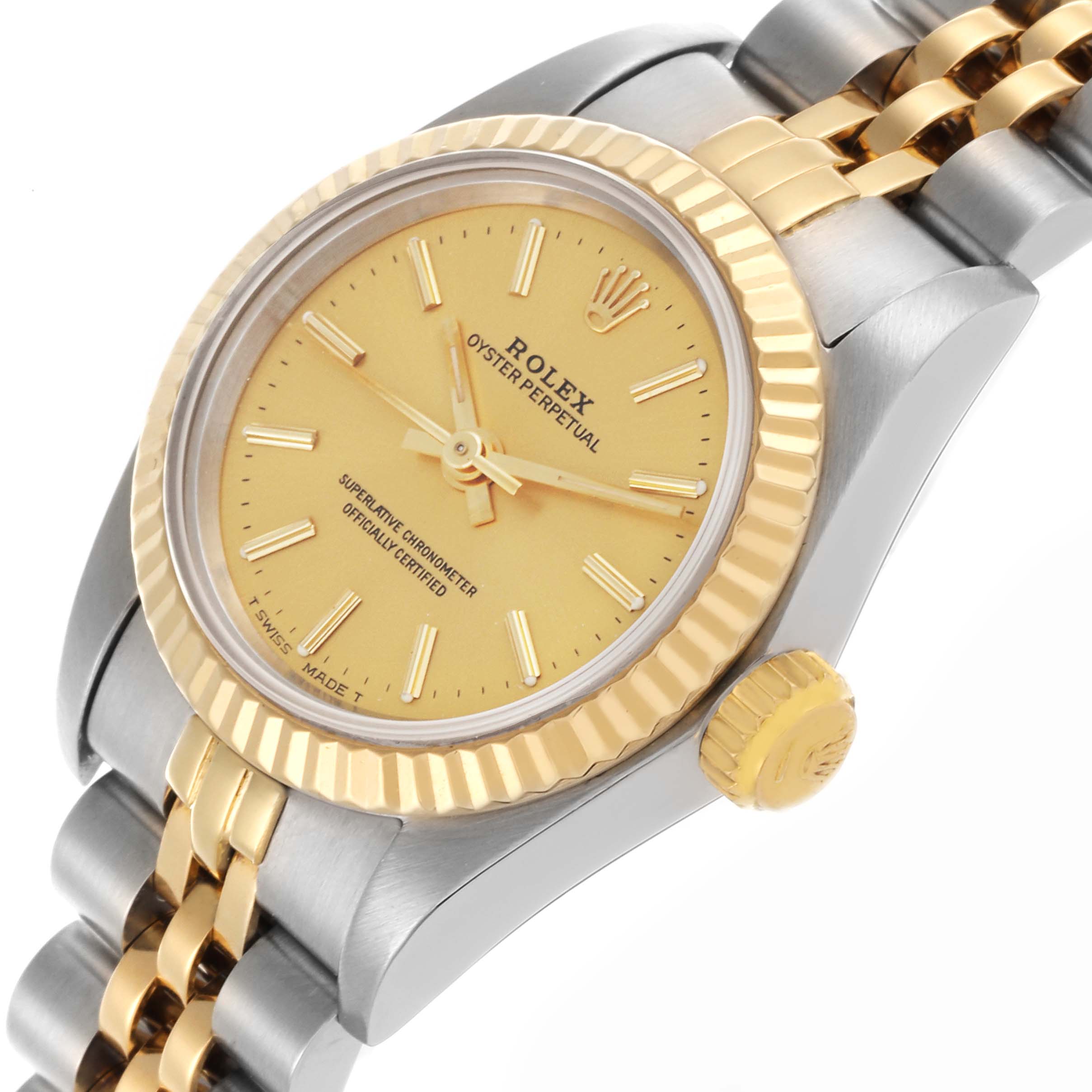 The Rolex Oyster Perpetual 67193 Women's Steel and Gold (two tone) Champagne Dial 67193 Women's Steel and Gold (two tone) Champagne Dial watch is shown at an angled side view, highlighting the bezel, crown, dial, and bracelet.