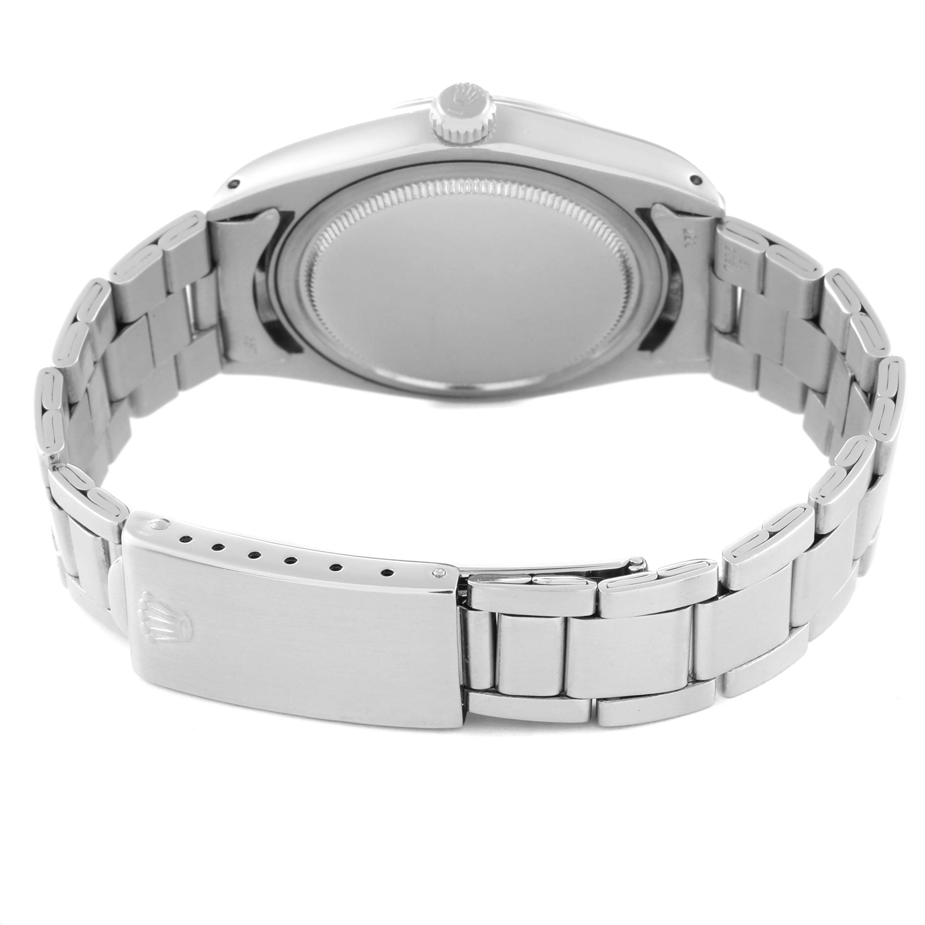 This image shows the back side of a Rolex Vintage Collection 6694 Men's Stainless Steel Silver Dial 6694 Men's Stainless Steel Silver Dial watch, focusing on the bracelet and clasp.