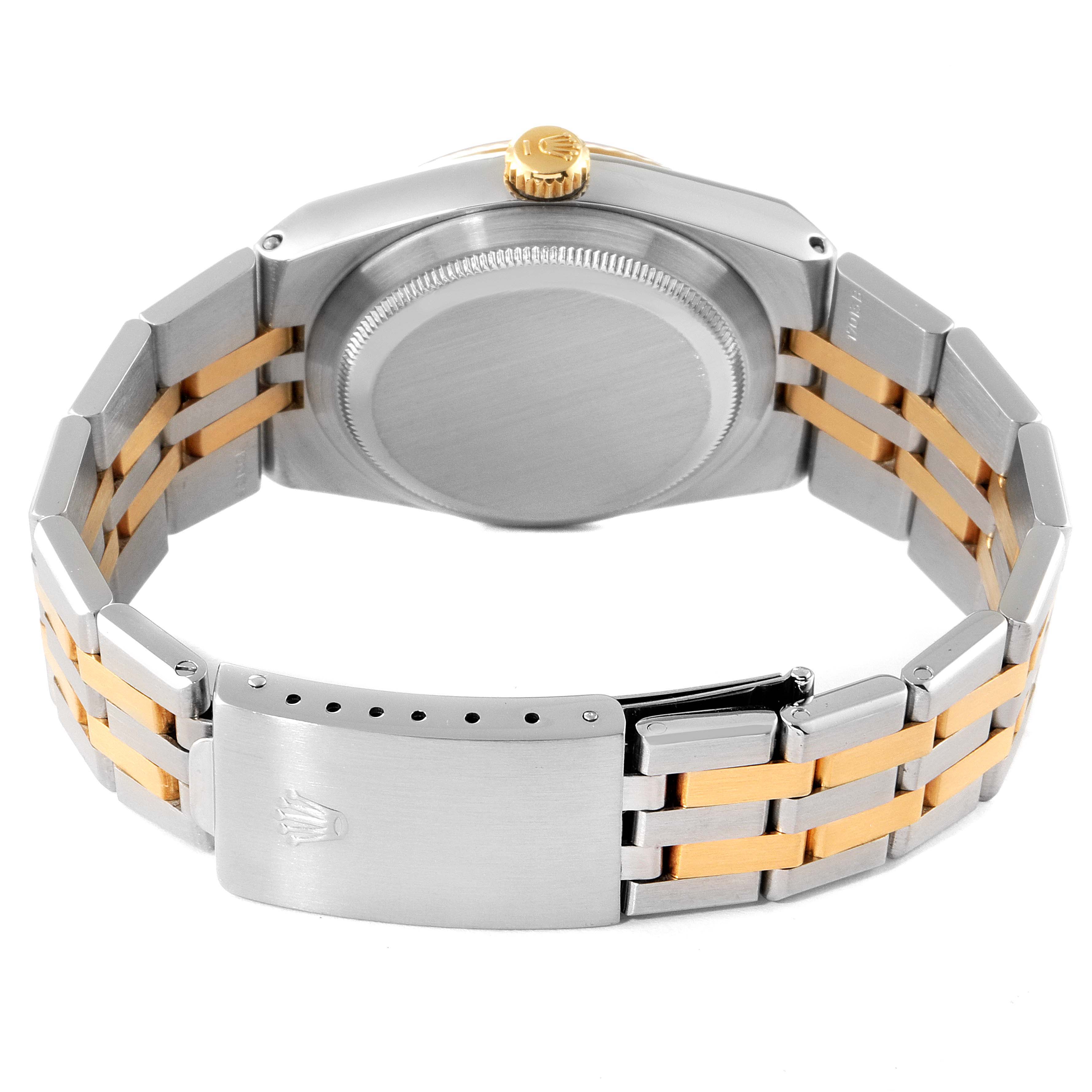The image shows the back and bracelet of a Rolex Oysterquartz 17013 Men's Steel and Gold (two tone) Blue Dial 17013 Men's Steel and Gold (two tone) Blue Dial watch, featuring a two-tone metal link design and clasp.