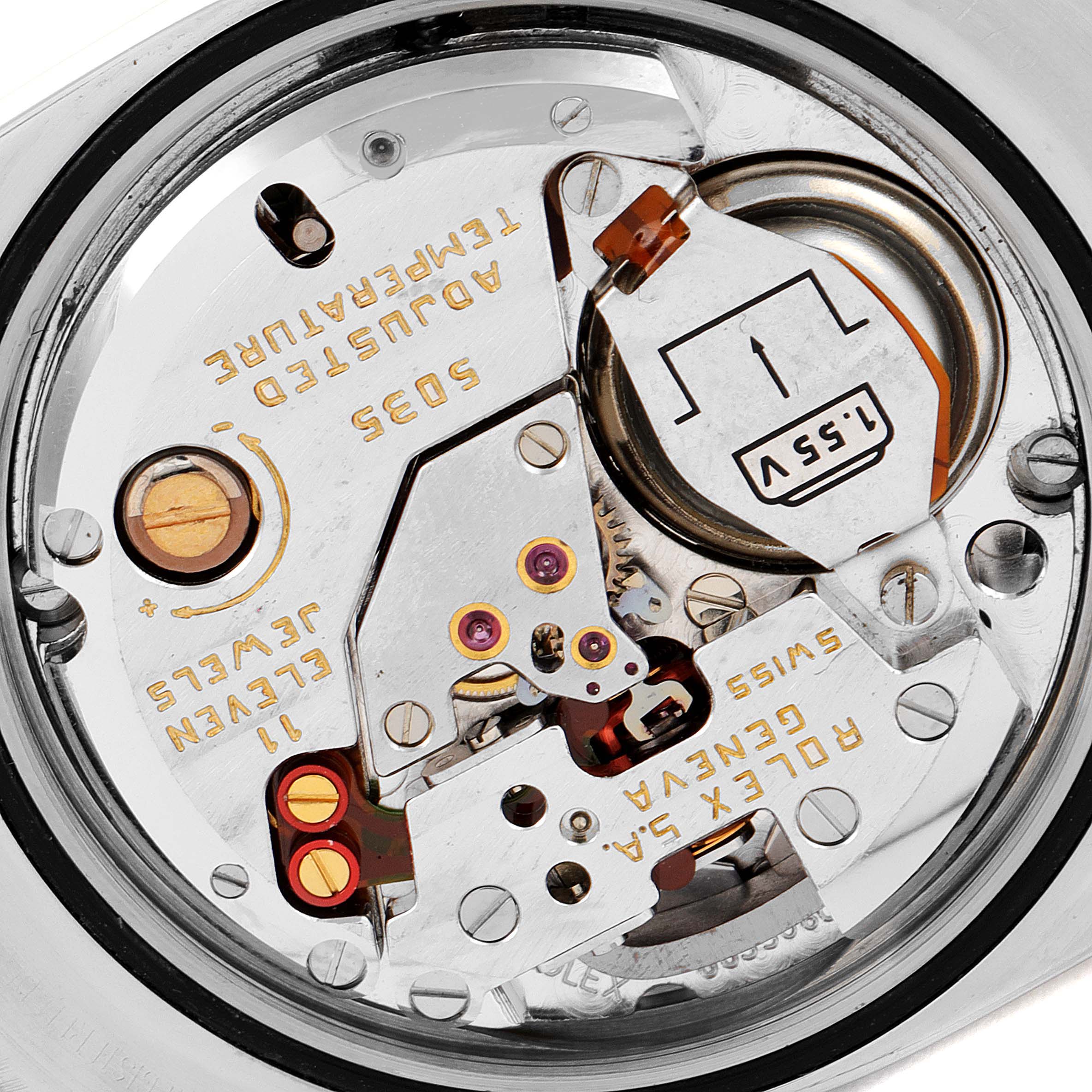 This is an internal view of the Rolex Oysterquartz 17013 Men's Steel and Gold (two tone) Blue Dial 17013 Men's Steel and Gold (two tone) Blue Dial watch, showcasing its movement and mechanisms.