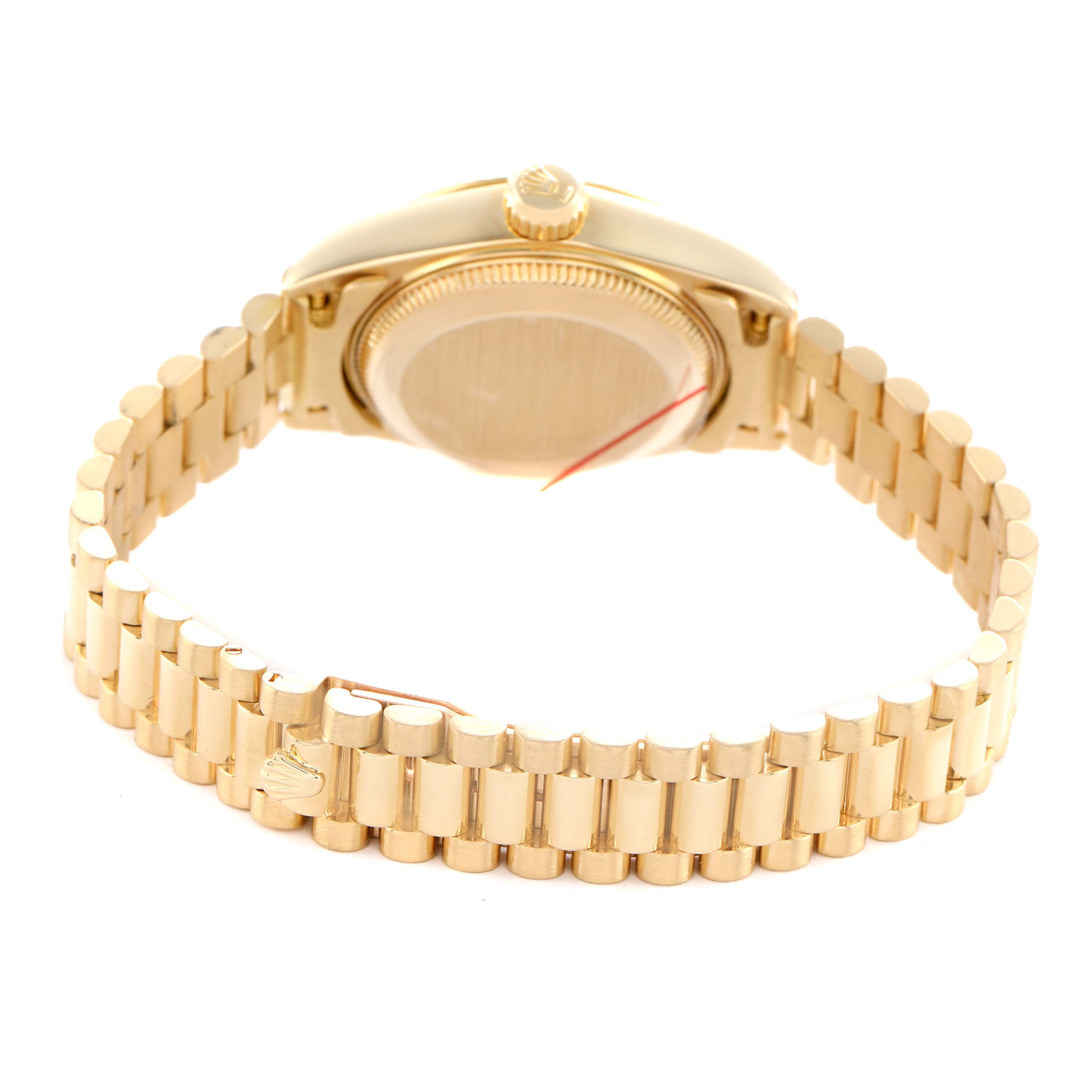 The image shows the back case, crown, and bracelet of a Rolex Datejust 69178 Women's Yellow Gold Champagne Dial watch from a slightly angled rear view.