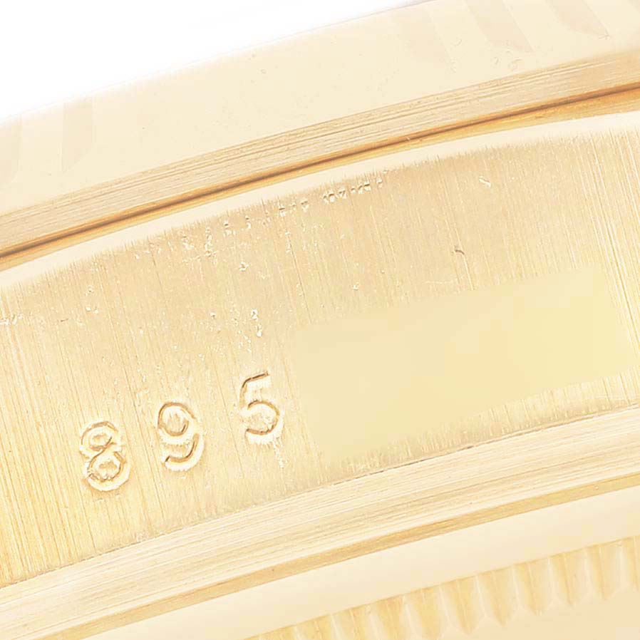 This close-up image shows the engraved numbers on the caseback of a Rolex President 18038 Men
s Yellow Gold Champagne Dial 18038 Men
s Yellow Gold Champagne Dial model watch.