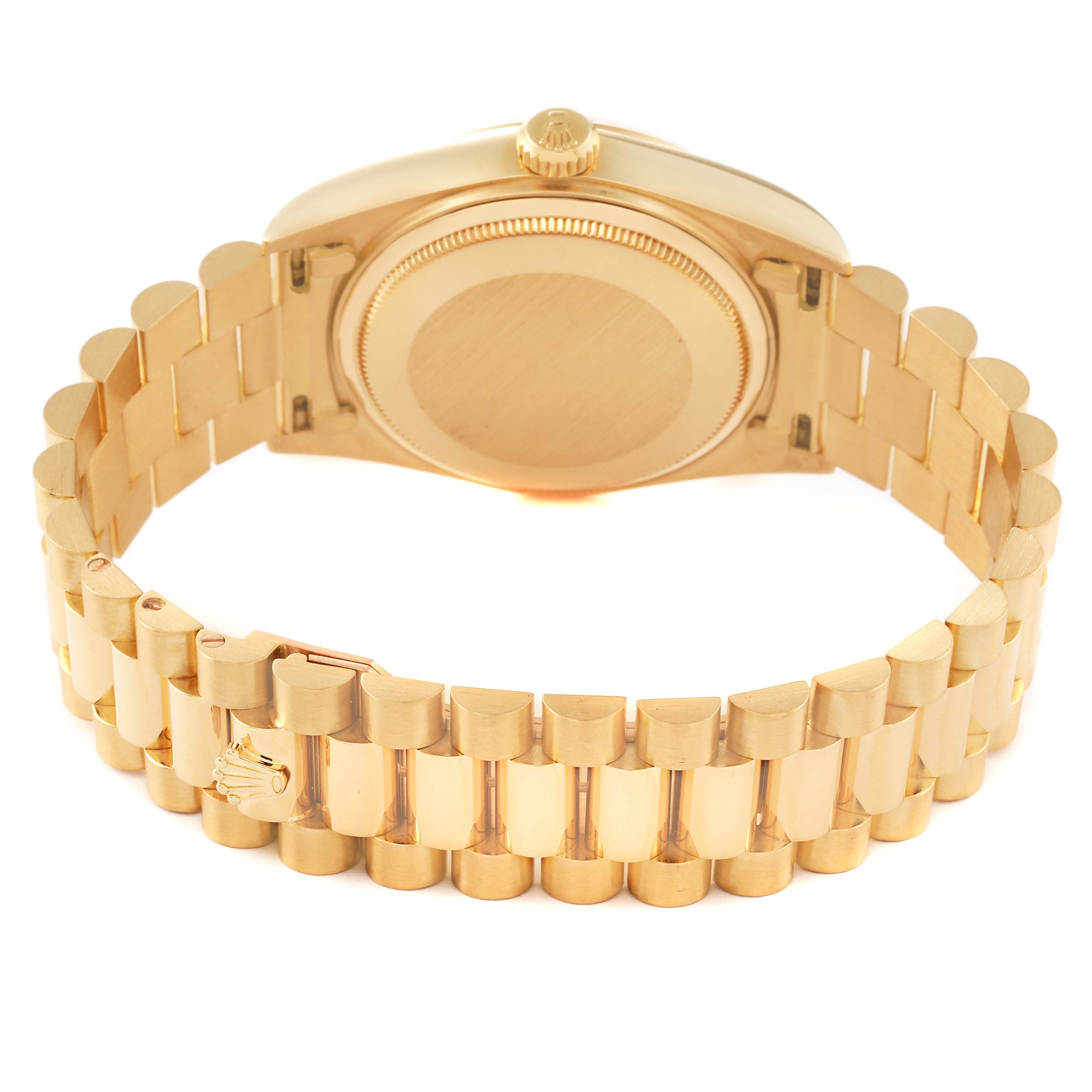 This image shows the back case and gold bracelet of a Rolex President 18038 Men
s Yellow Gold Champagne Dial 18038 Men
s Yellow Gold Champagne Dial model watch.