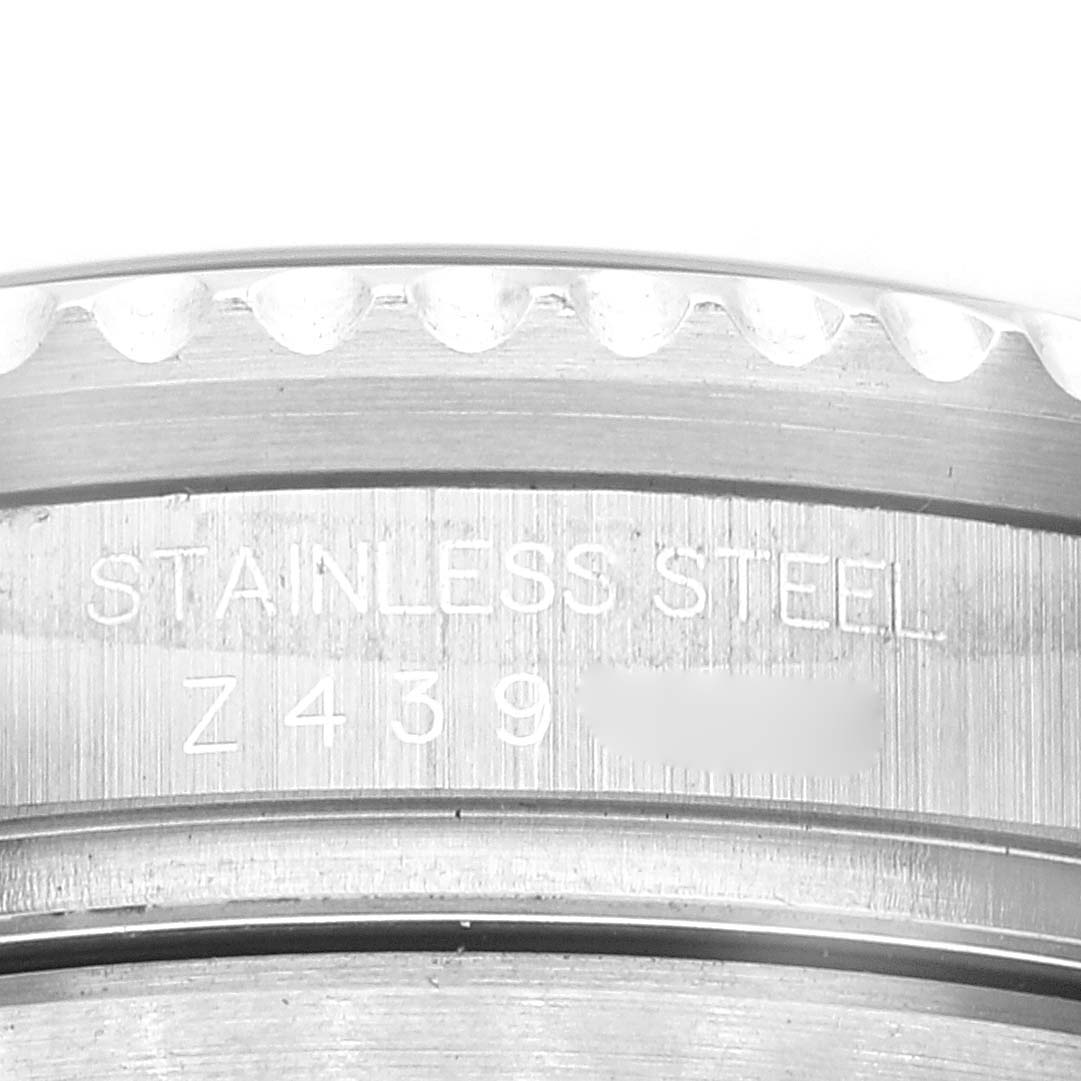 This image shows a close-up of the stainless steel bezel and case back engraving on a Rolex Sea-Dweller 16600T Men
s Stainless Steel Black Dial 16600T Men
s Stainless Steel Black Dial watch.