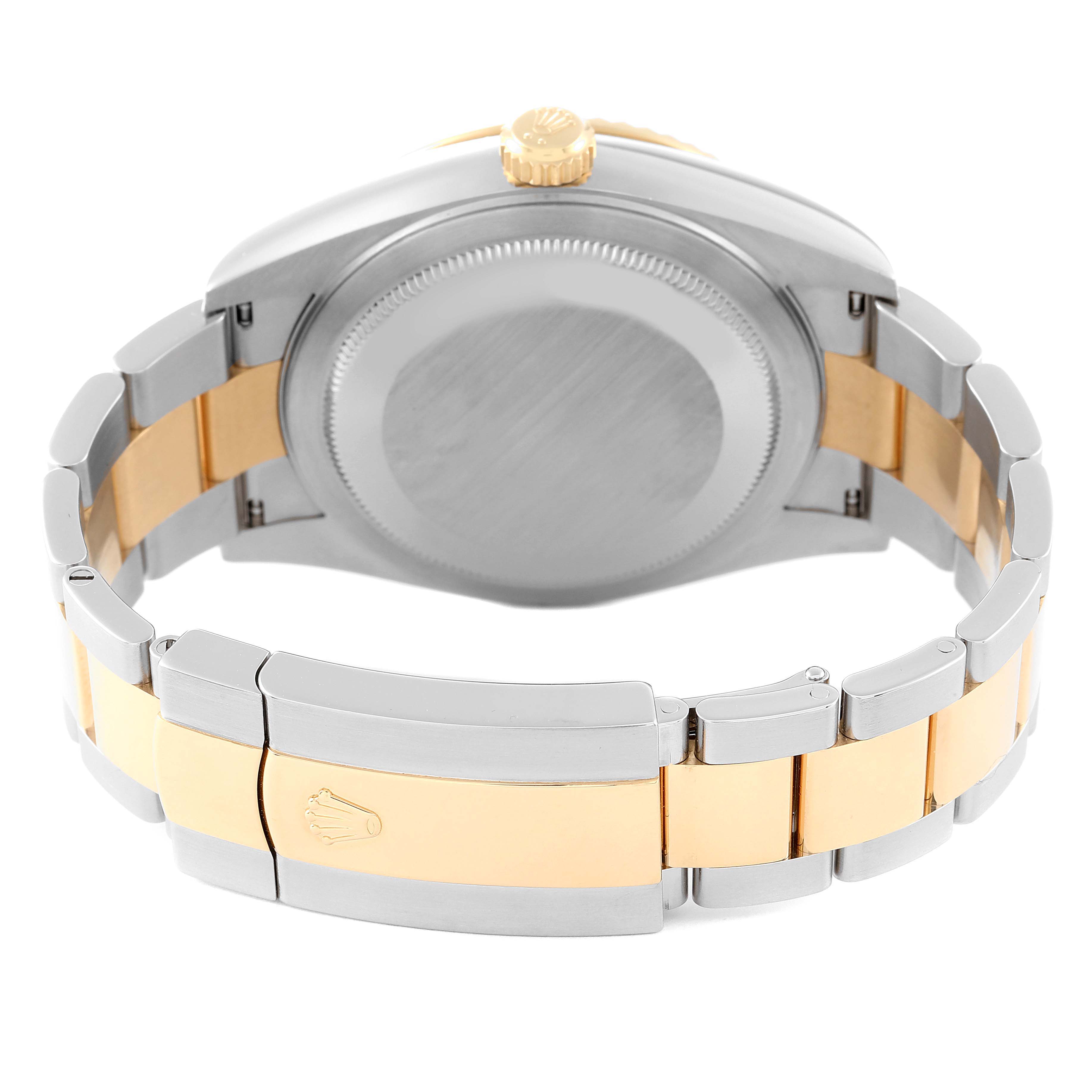 The image shows the back view of a Rolex Sky-Dweller 326933 Men's Steel and Gold (two tone) Champagne Dial 326933 Men's Steel and Gold (two tone) Champagne Dial watch, displaying its case back, crown, and two-tone bracelet.