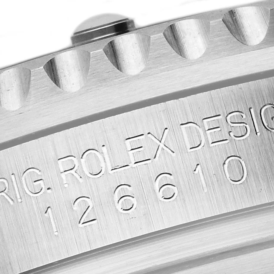 This close-up image shows the engraved side of the bezel of a Rolex Submariner 126610LN Men
s Stainless Steel Black Dial 126610LN Men
s Stainless Steel Black Dial, highlighting the model number 126610.