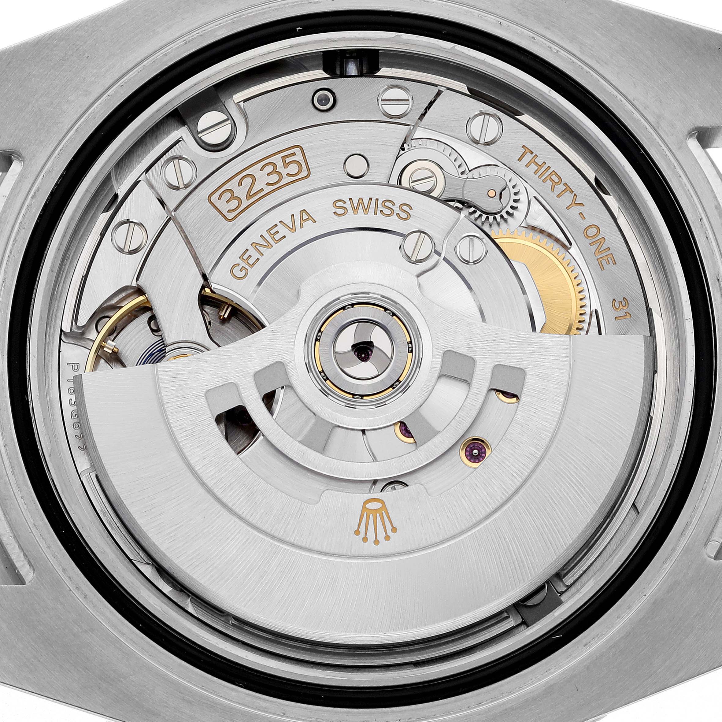 The image shows the intricate movement and components of the Rolex Submariner 126610LN Men
s Stainless Steel Black Dial 126610LN Men
s Stainless Steel Black Dial
s back, including its rotor and gears.