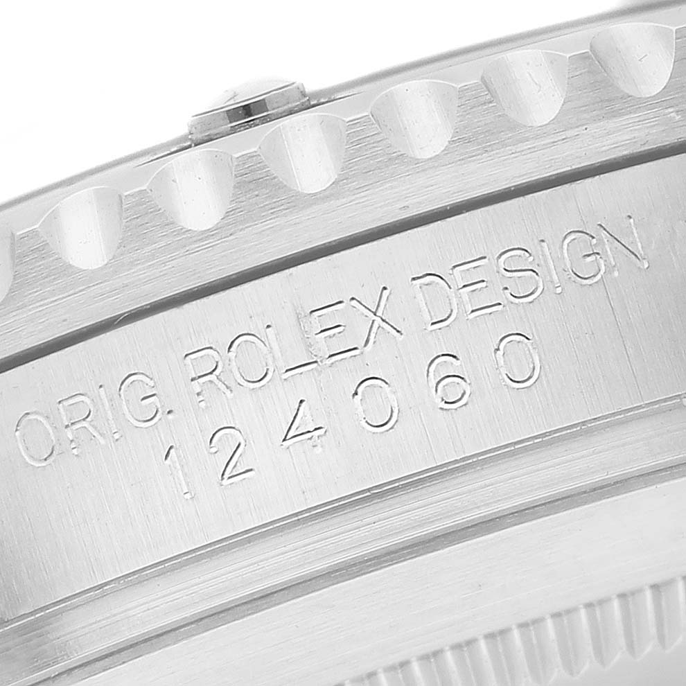 The image shows a close-up of the side of a Rolex Submariner 124060 Men
s Stainless Steel Black Dial 124060 Men
s Stainless Steel Black Dial watch, displaying the engraved model number and design details.