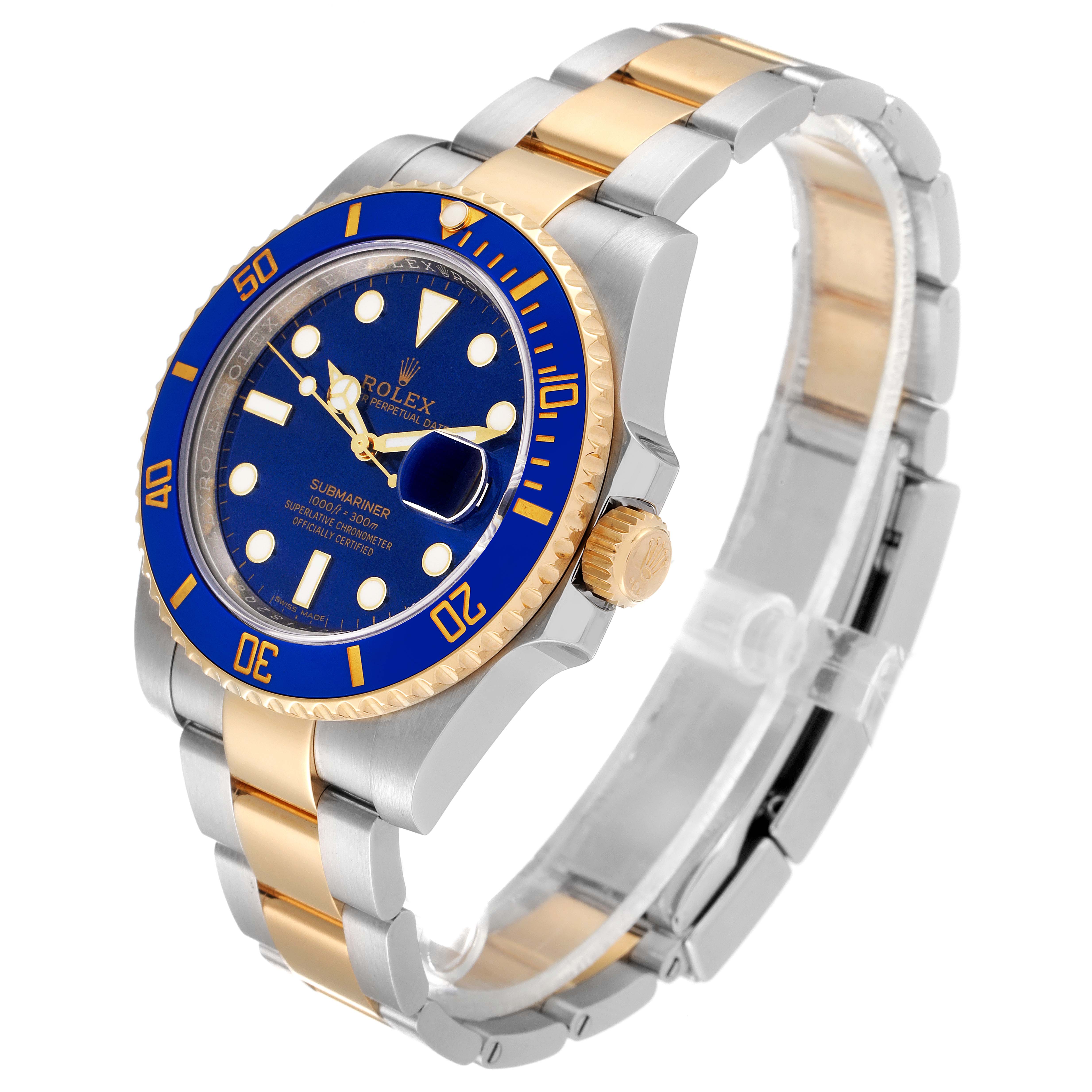 This Rolex Submariner 116613 Men's Steel and Gold (two tone) Blue Dial 116613 Men's Steel and Gold (two tone) Blue Dial watch is shown at an angle from the top-front, highlighting the face, bezel, crown, and bracelet.