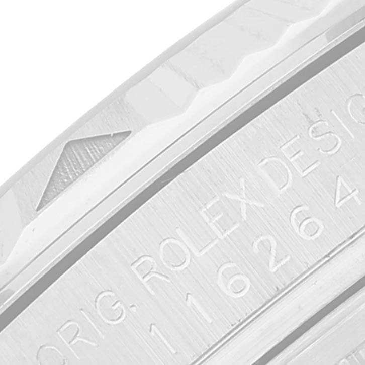 The image shows a close-up angle of the bezel and engraved serial number area on a Rolex Turn-o-Graph 116264 Men
s Stainless Steel White Dial 116264 Men
s Stainless Steel White Dial watch.
