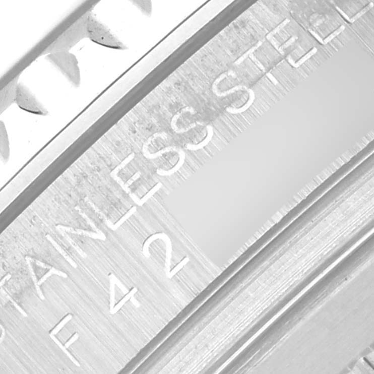 The image shows a close-up of the bezel and case side with "STAINLESS STEEL" engraving of a Rolex Yacht-Master 16622 Men's Steel and Gold (two tone) Silver Dial 16622 Men's Steel and Gold (two tone) Silver Dial watch.