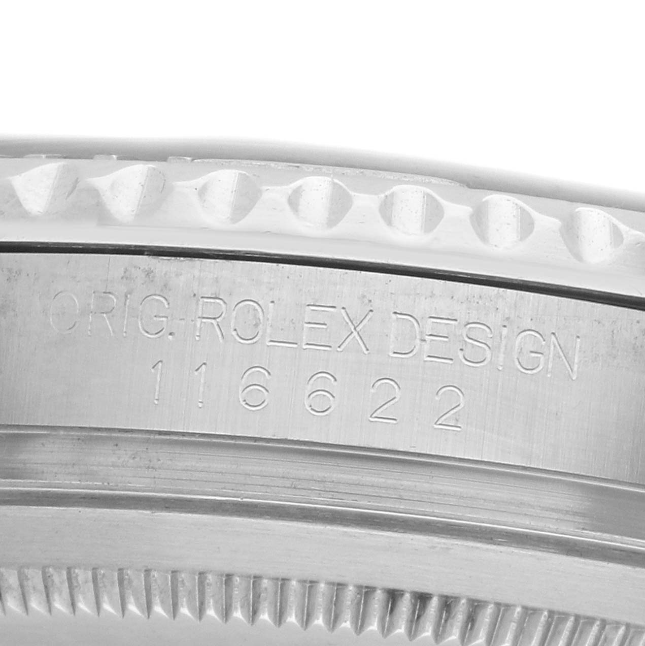 The image shows a close-up of the side engraving on the bezel of a Rolex Yacht-Master 116622 Men's Stainless Steel Grey Dial, displaying the design and model number.