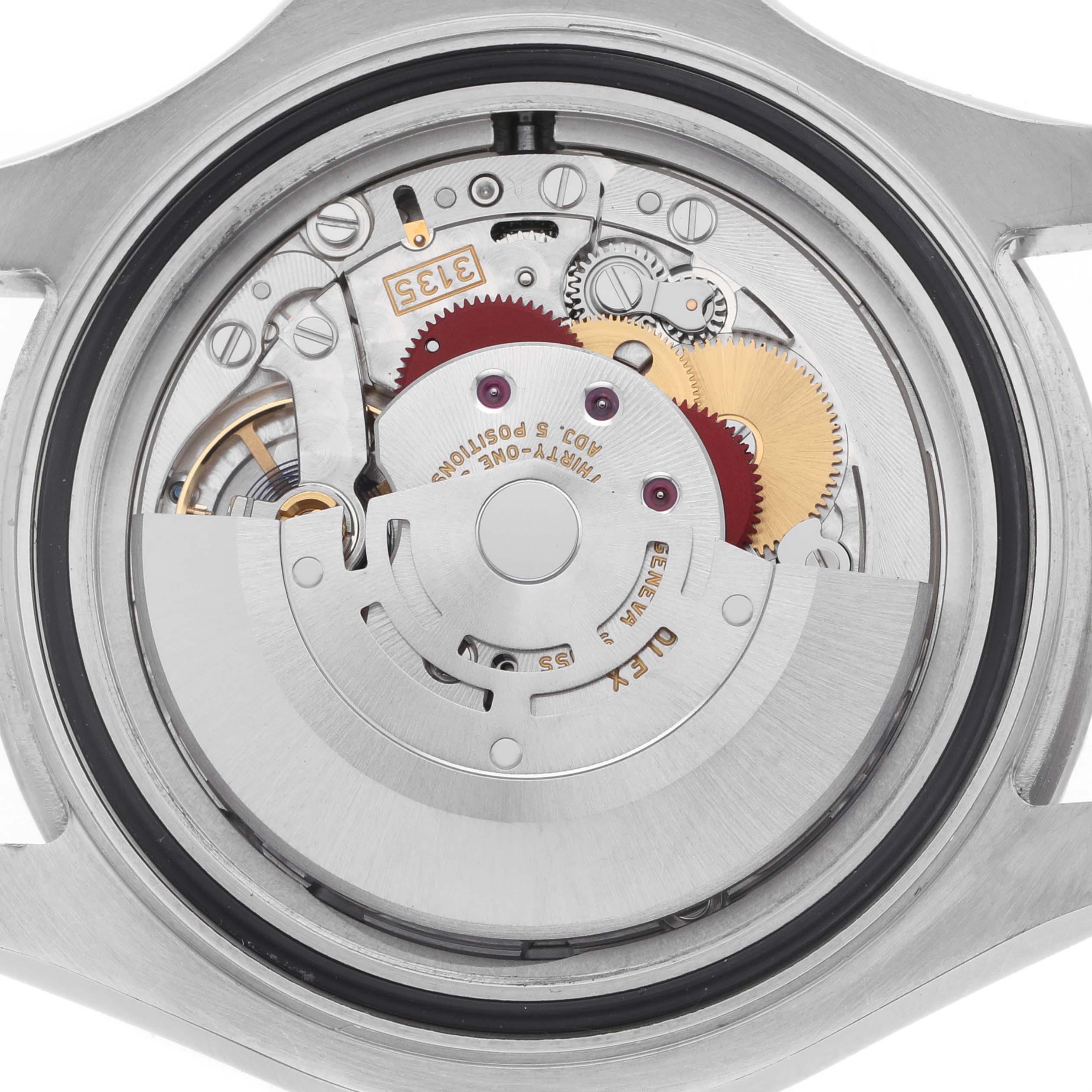 The image shows the movement of a Rolex Yacht-Master 116622 Men's Stainless Steel Grey Dial watch from the back, highlighting gears and the rotor.