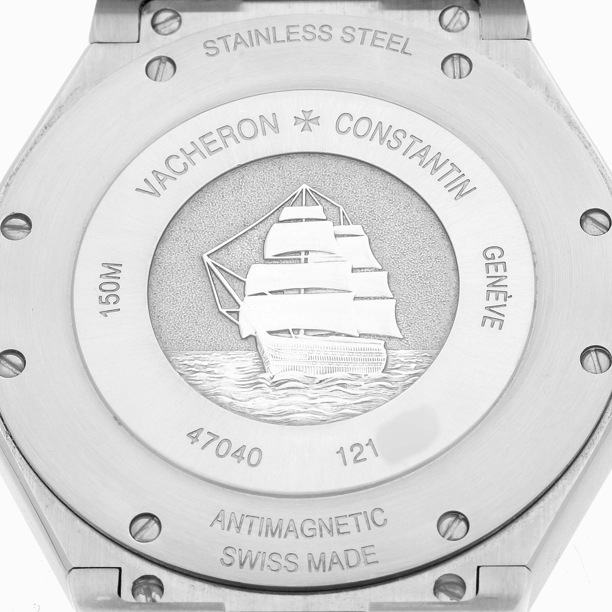 The image shows the back of a Vacheron Constantin Overseas 47040 Men's Stainless Steel Silver Dial watch, highlighting the engraved ship and inscriptions.