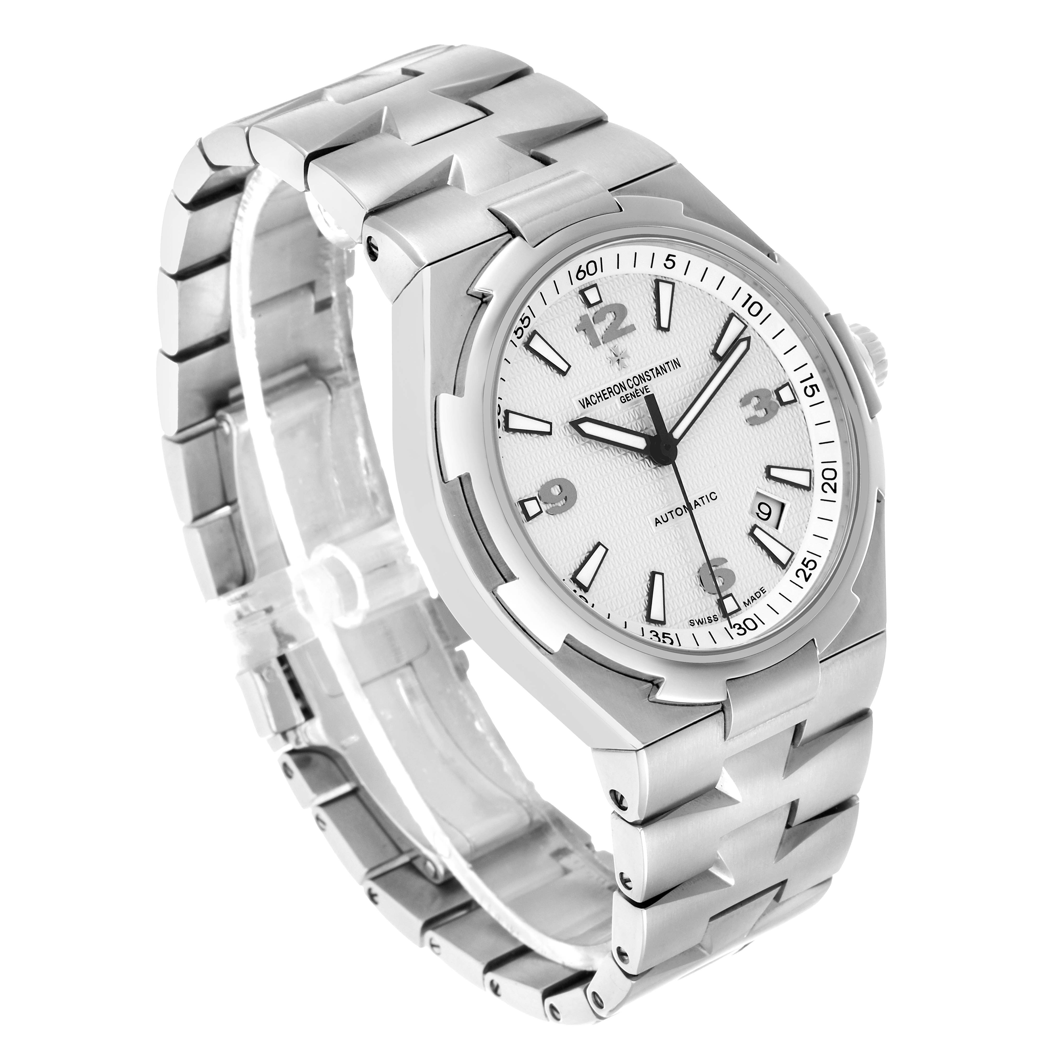The Vacheron Constantin Overseas 47040 Men's Stainless Steel Silver Dial model is shown at a three-quarter angle, highlighting the face, bracelet, and crown.