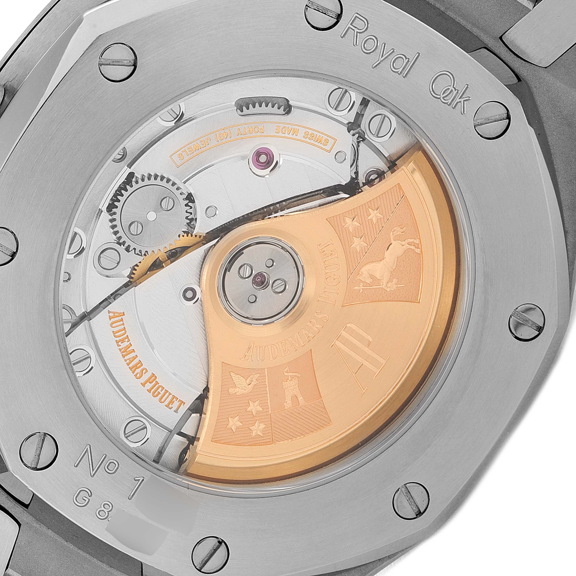 The image shows the back view of the Audemars Piguet Royal Oak 15300ST.00.1220ST.01 Men's Stainless Steel White Dial 15300ST.00.1220ST.01 Men's Stainless Steel White Dial watch, highlighting its automatic movement and rotor.