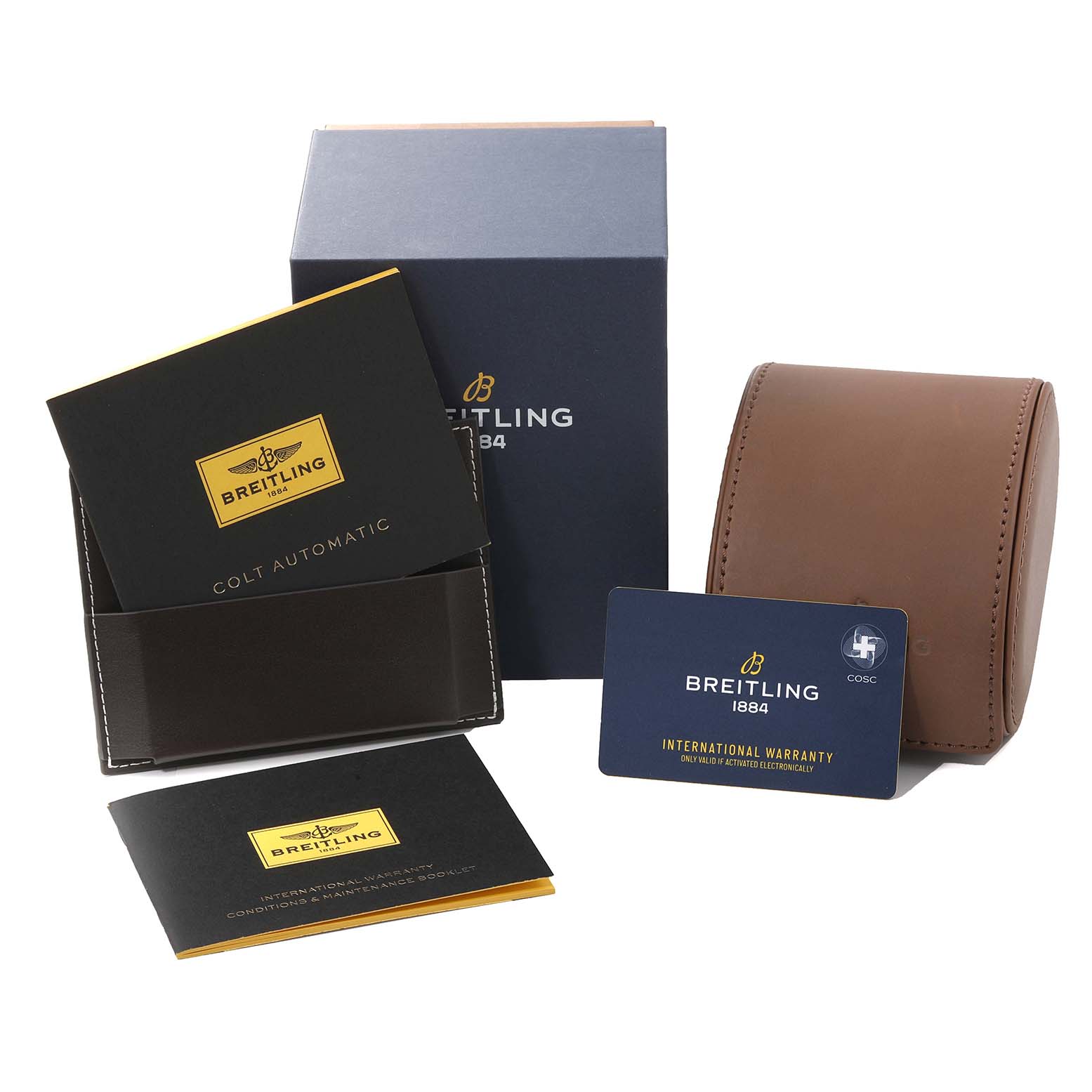 The image shows a Breitling Colt A17313 Men
s Stainless Steel White Dial A17313 Men
s Stainless Steel White Dial watch box, leather case, documents, and an international warranty card, viewed from a front angle.