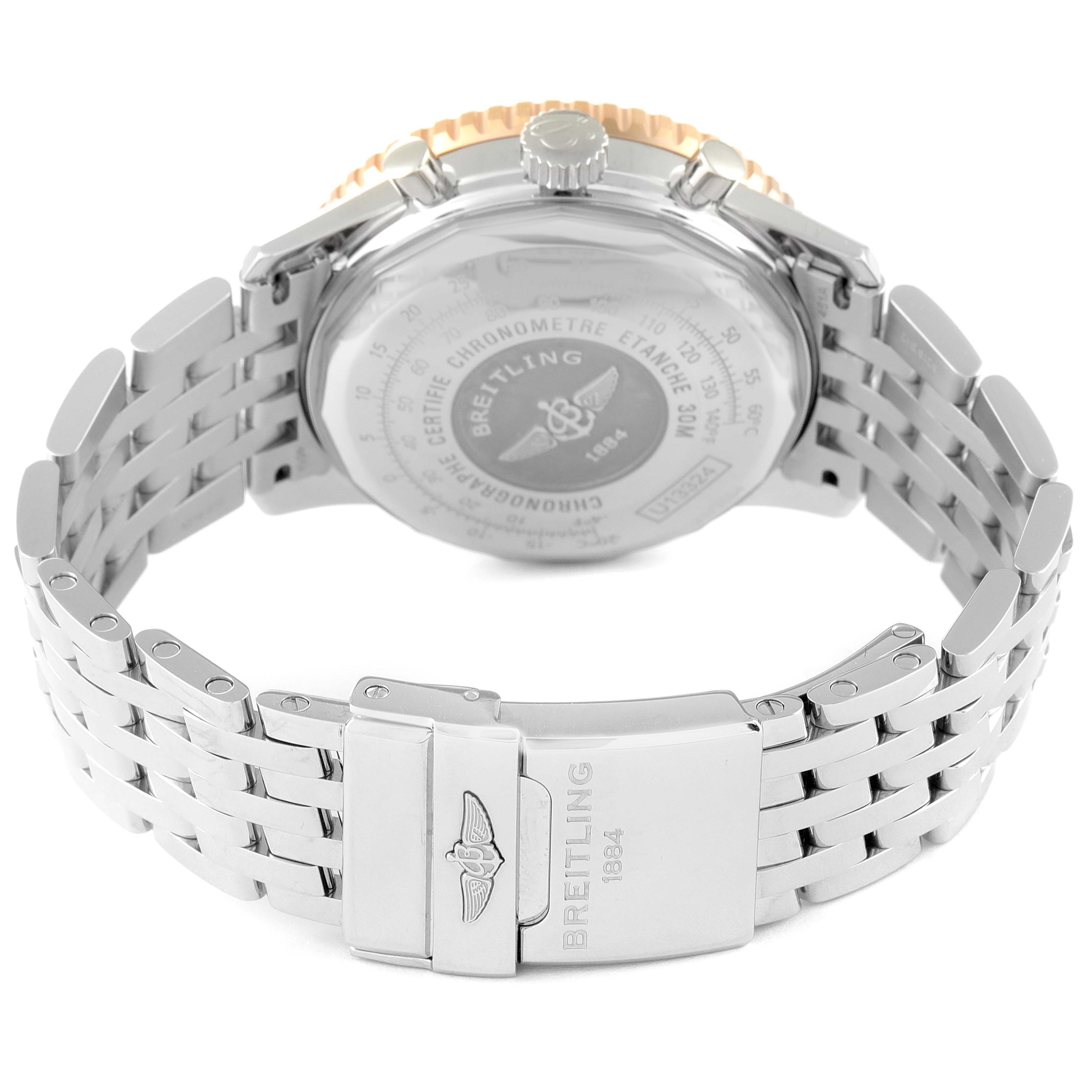 This image shows the back view of a Breitling Navitimer U13324211B1X1 Men's Steel and Gold (two tone) Black Dial U13324211B1X1 Men's Steel and Gold (two tone) Black Dial watch, displaying its case back and stainless steel bracelet clasp.