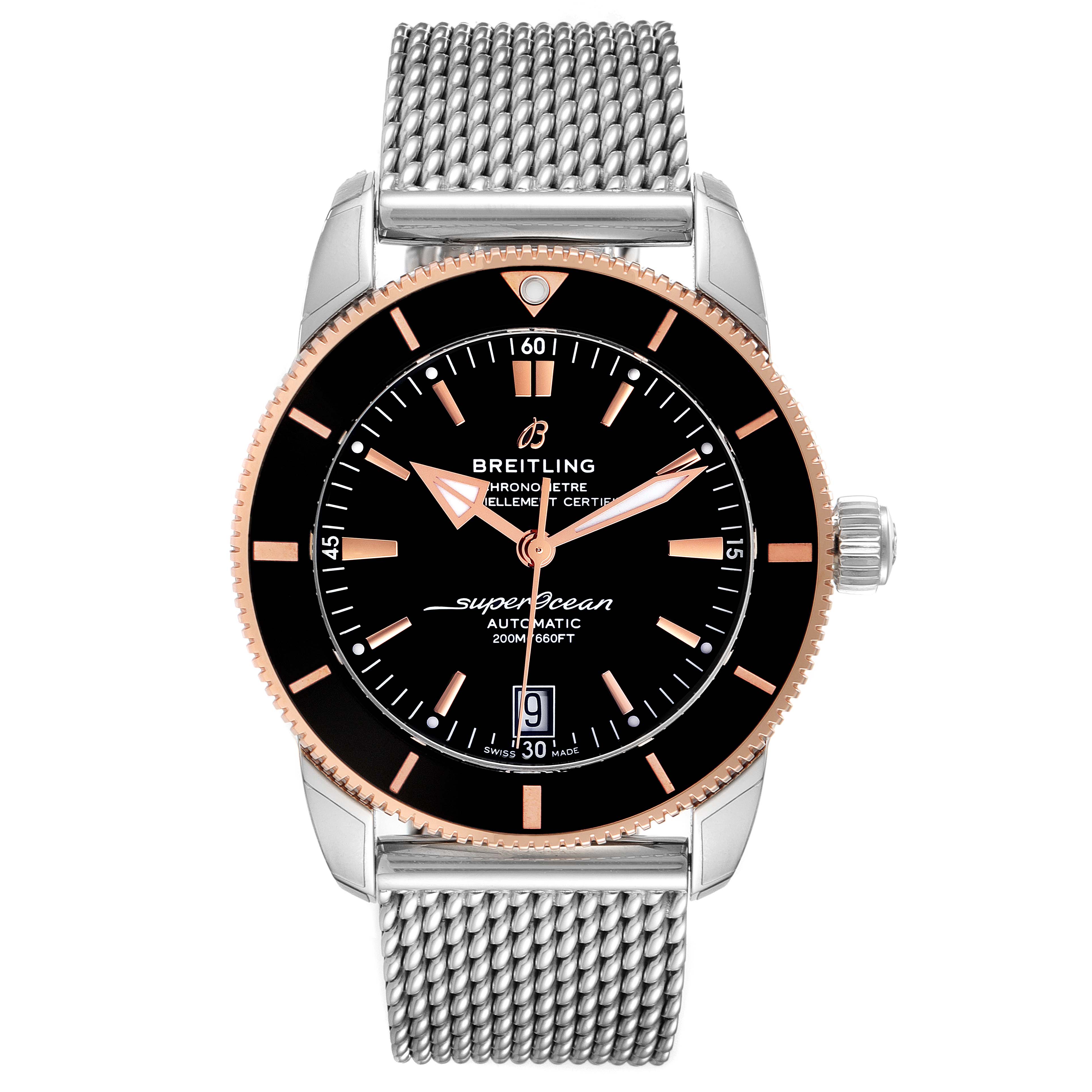 The Breitling Superocean UB201012/BG53/154A Men
s Steel and Gold (two tone) Black Dial UB201012/BG53/154A Men
s Steel and Gold (two tone) Black Dial watch is shown from the front, displaying the black dial, hands, bezel, and mesh bracelet.