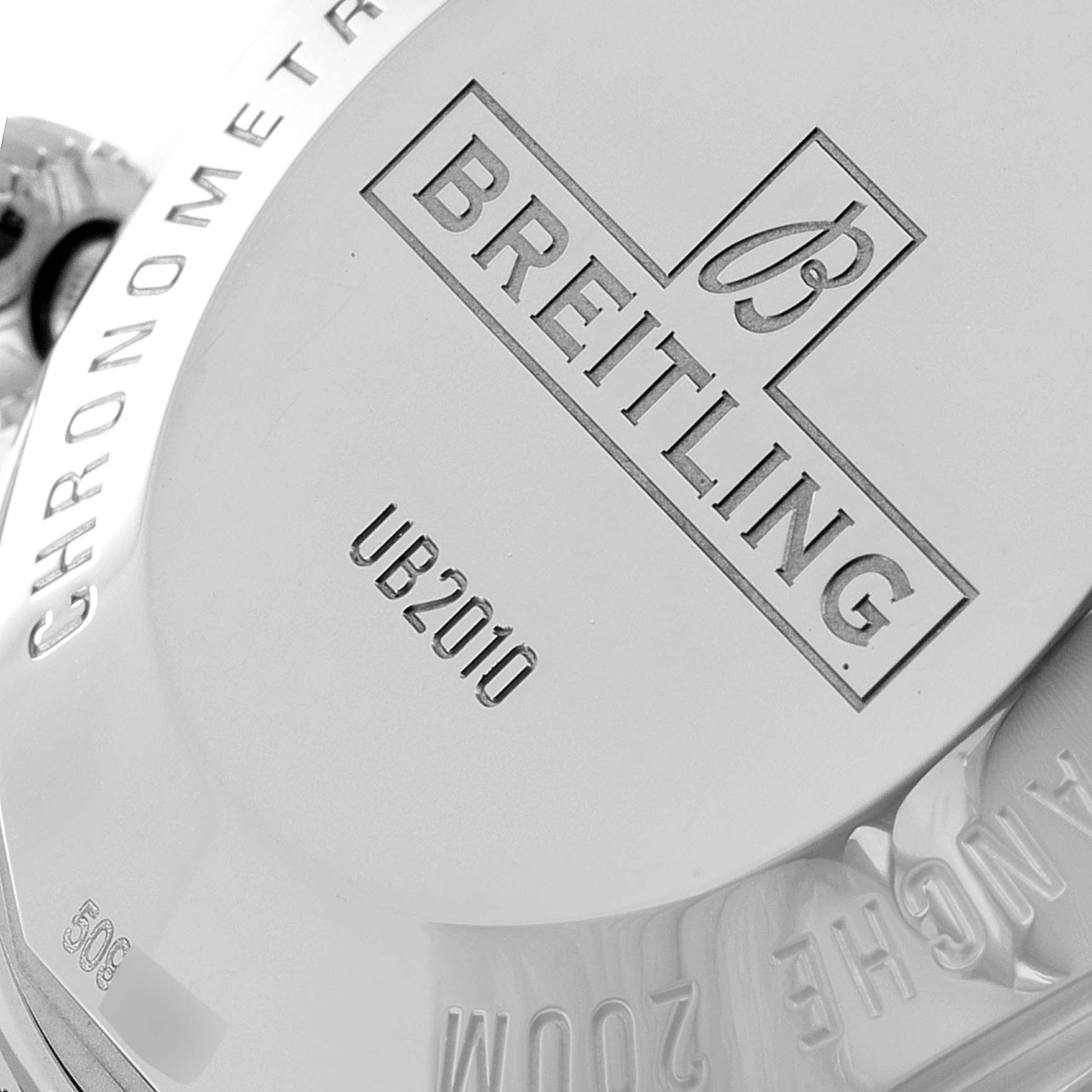 The image shows a close-up of the case back of a Breitling Superocean UB201012/BG53/154A Men
s Steel and Gold (two tone) Black Dial UB201012/BG53/154A Men
s Steel and Gold (two tone) Black Dial watch, displaying the brand logo and model number UB2010.